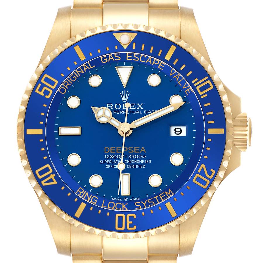 The Rolex Sea-Dweller 136668 Men's Yellow Gold Blue Dial watch is shown from the front, highlighting its blue dial, gold case, and bezel details.