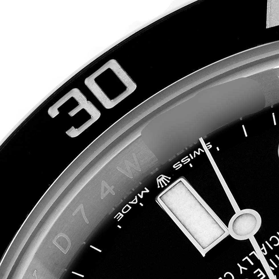 The image shows a close-up of the bezel and part of the dial of a Rolex Submariner 126610LN Men
s Stainless Steel Black Dial 126610LN Men
s Stainless Steel Black Dial watch, highlighting the "30" marker.