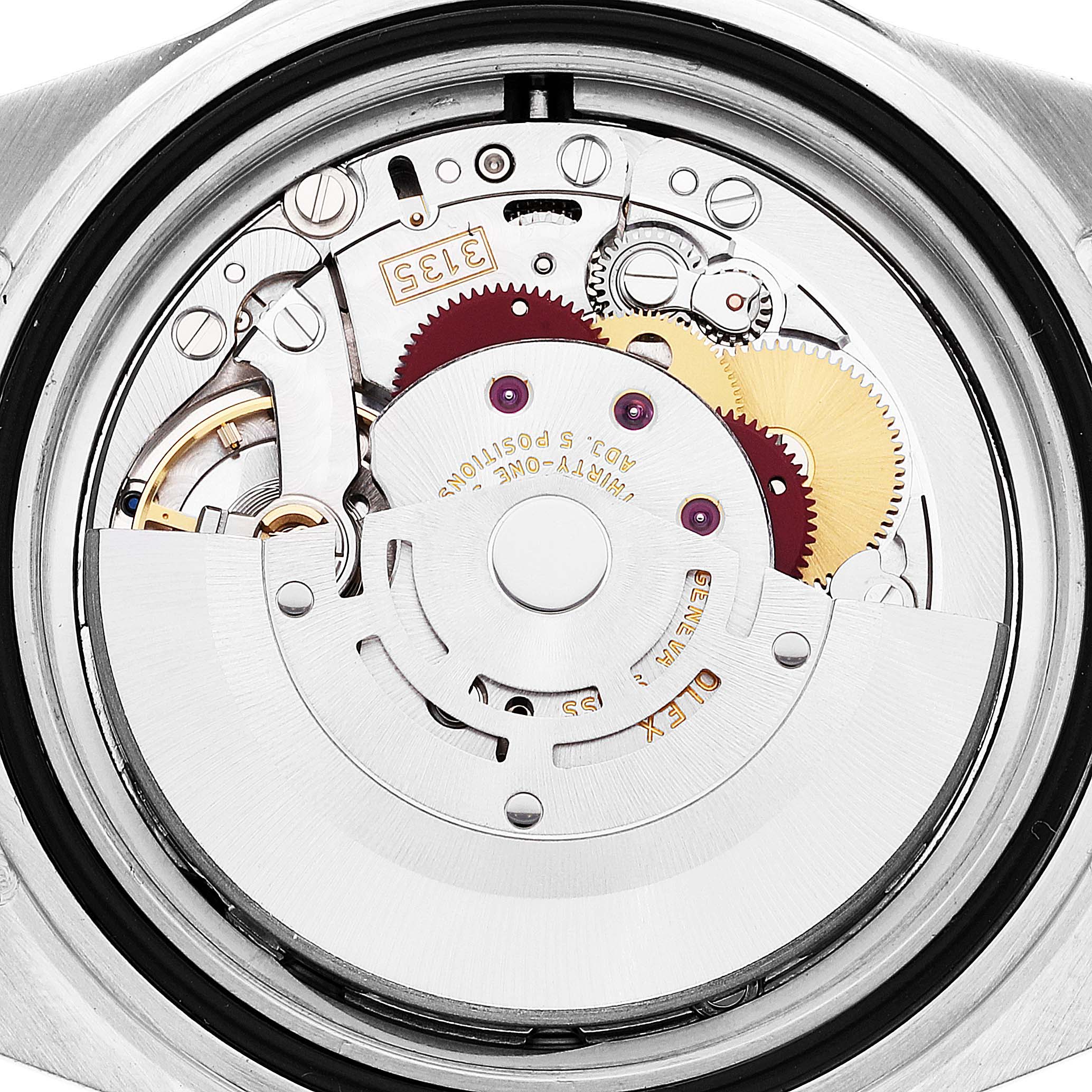 This close-up shot captures the intricate internal movement mechanism of a Rolex Submariner 16613 Men's Steel and Gold (two tone) Blue Dial 16613 Men's Steel and Gold (two tone) Blue Dial watch.