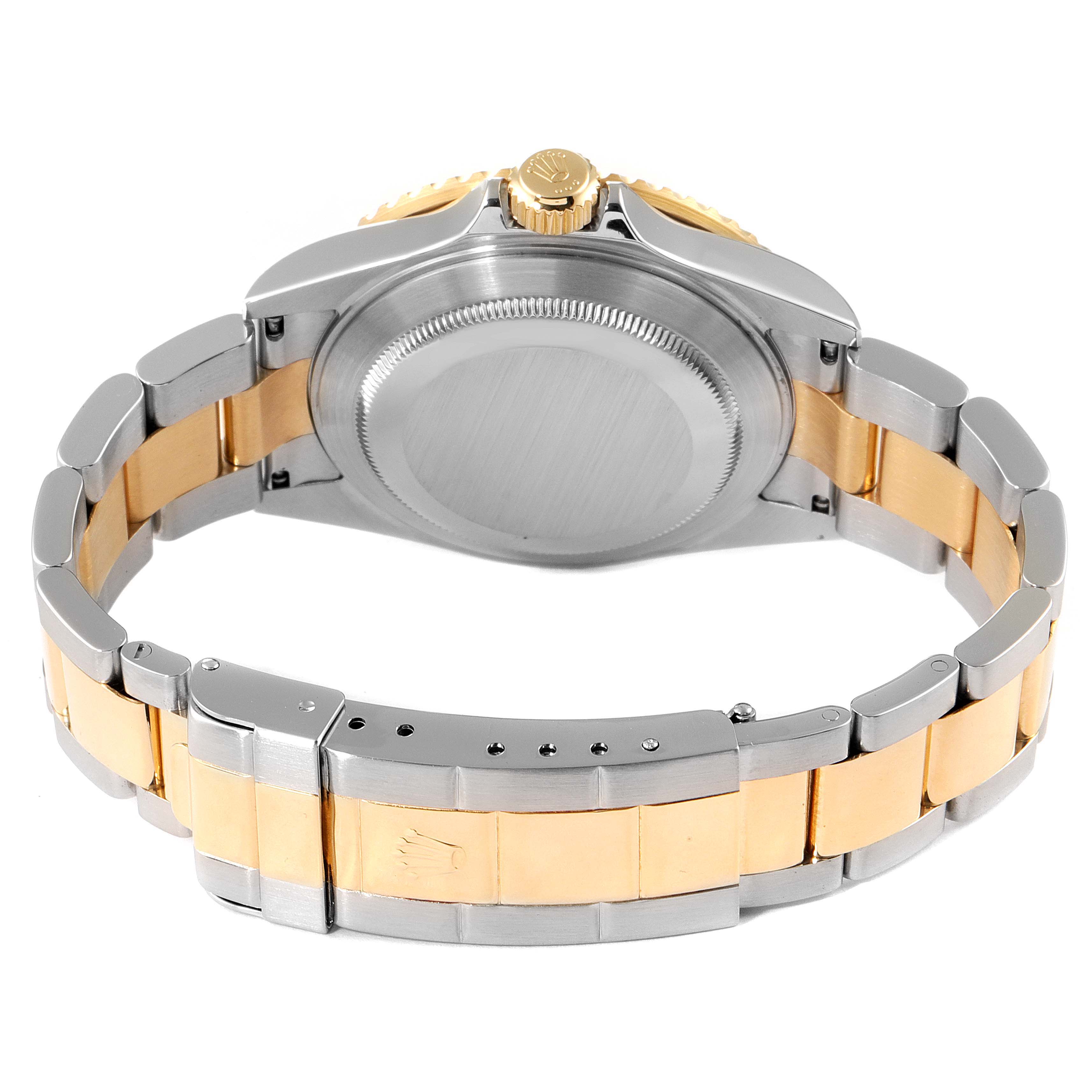 This image shows the rear view of a Rolex Submariner 16613 Men
s Steel and Gold (two tone) Blue Dial 16613 Men
s Steel and Gold (two tone) Blue Dial, highlighting the case back, bracelet, and clasp.