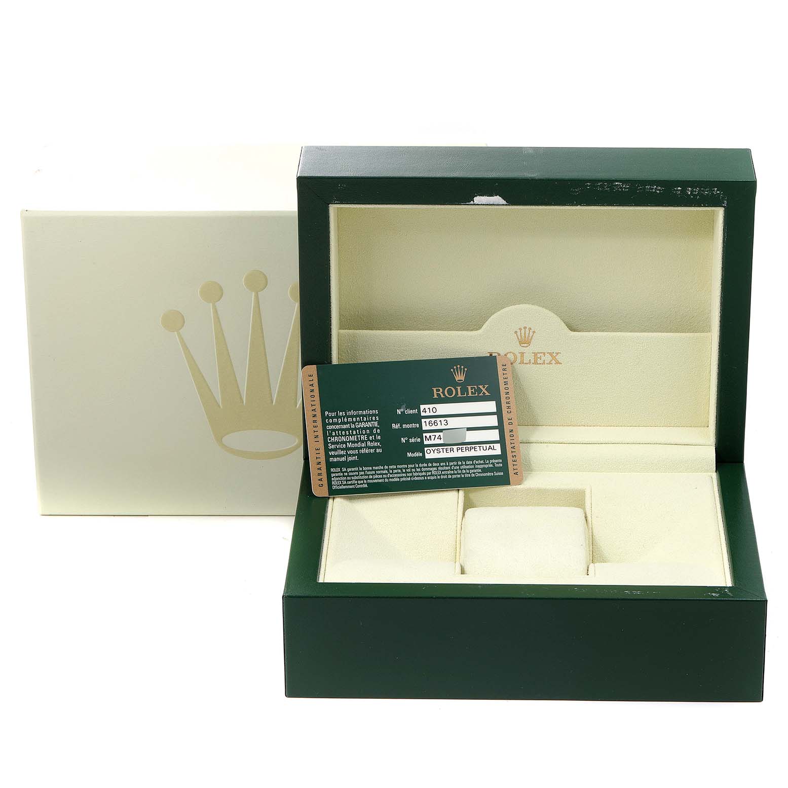 This image shows the packaging and Best Quality
ity card for the Rolex Submariner 16613 Men
s Steel and Gold (two tone) Blue Dial 16613 Men
s Steel and Gold (two tone) Blue Dial watch, with an open green box.