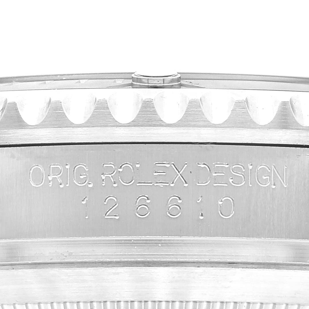 The image shows an angled close-up of the side of a Rolex Submariner 126610 Men's Stainless Steel Black Dial 126610 Men's Stainless Steel Black Dial watch, revealing the model number 126610 and the text "ORIG. ROLEX DESIGN."