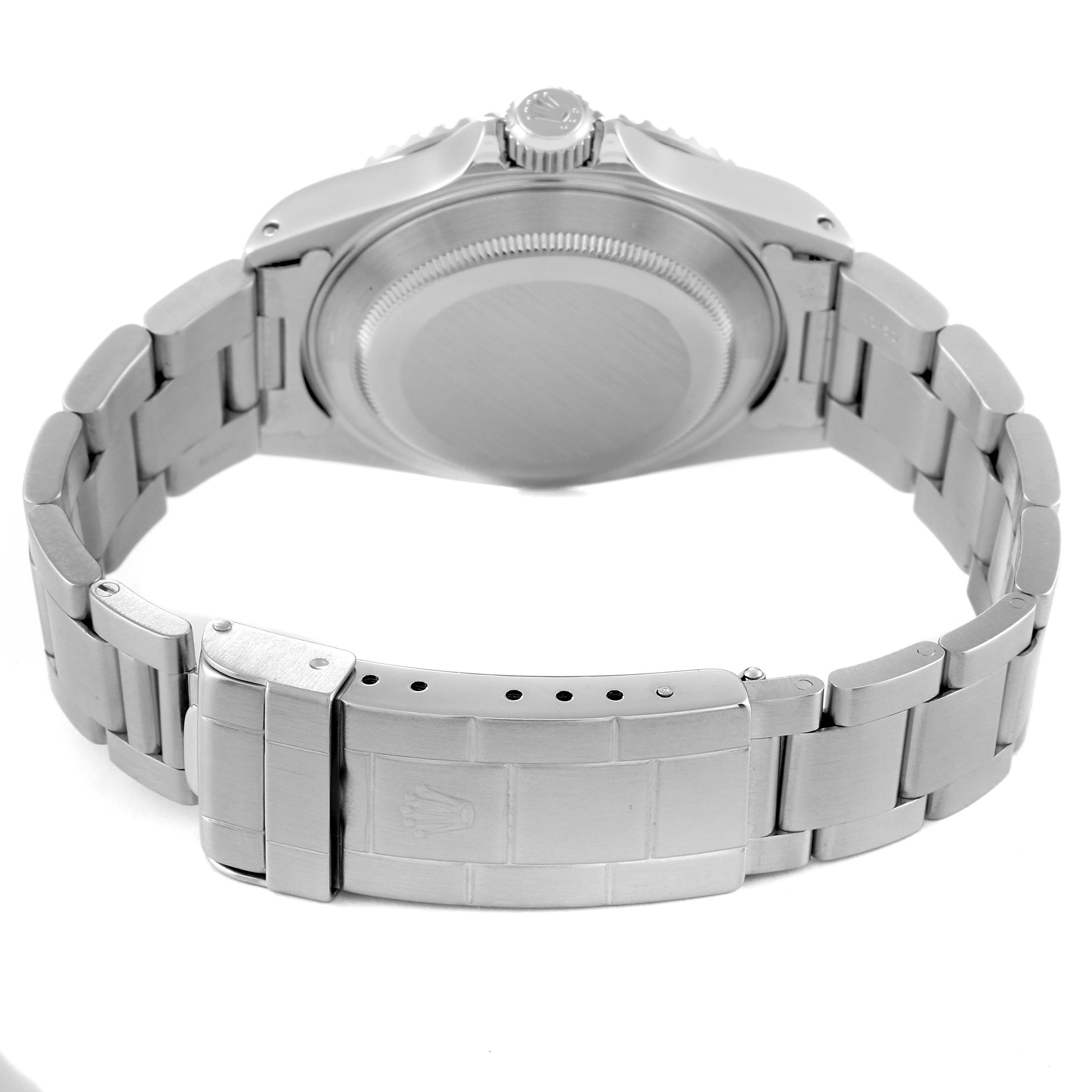 This image shows the back view of a Rolex Submariner 14060 Men
s Stainless Steel Black Dial 14060 Men
s Stainless Steel Black Dial, focusing on the case back and metal bracelet with a clasp.