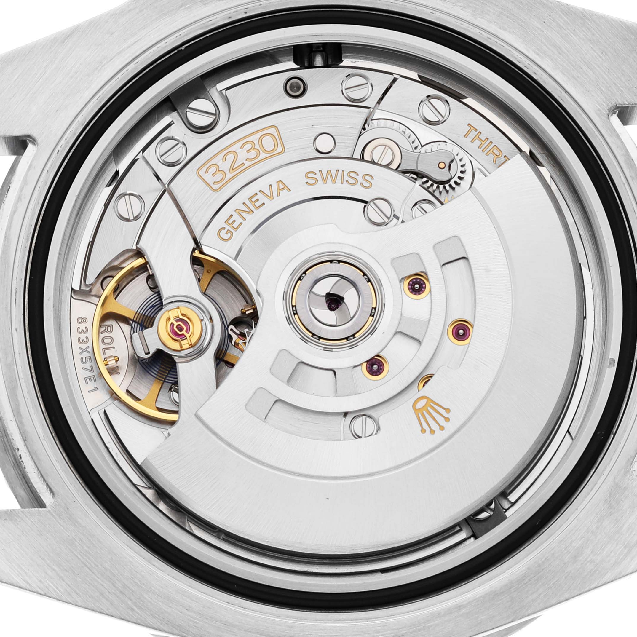 This image shows a close-up view of the movement mechanism of the Rolex Submariner 124060 Men's Stainless Steel Black Dial 124060 Men's Stainless Steel Black Dial watch, highlighting the intricate components.