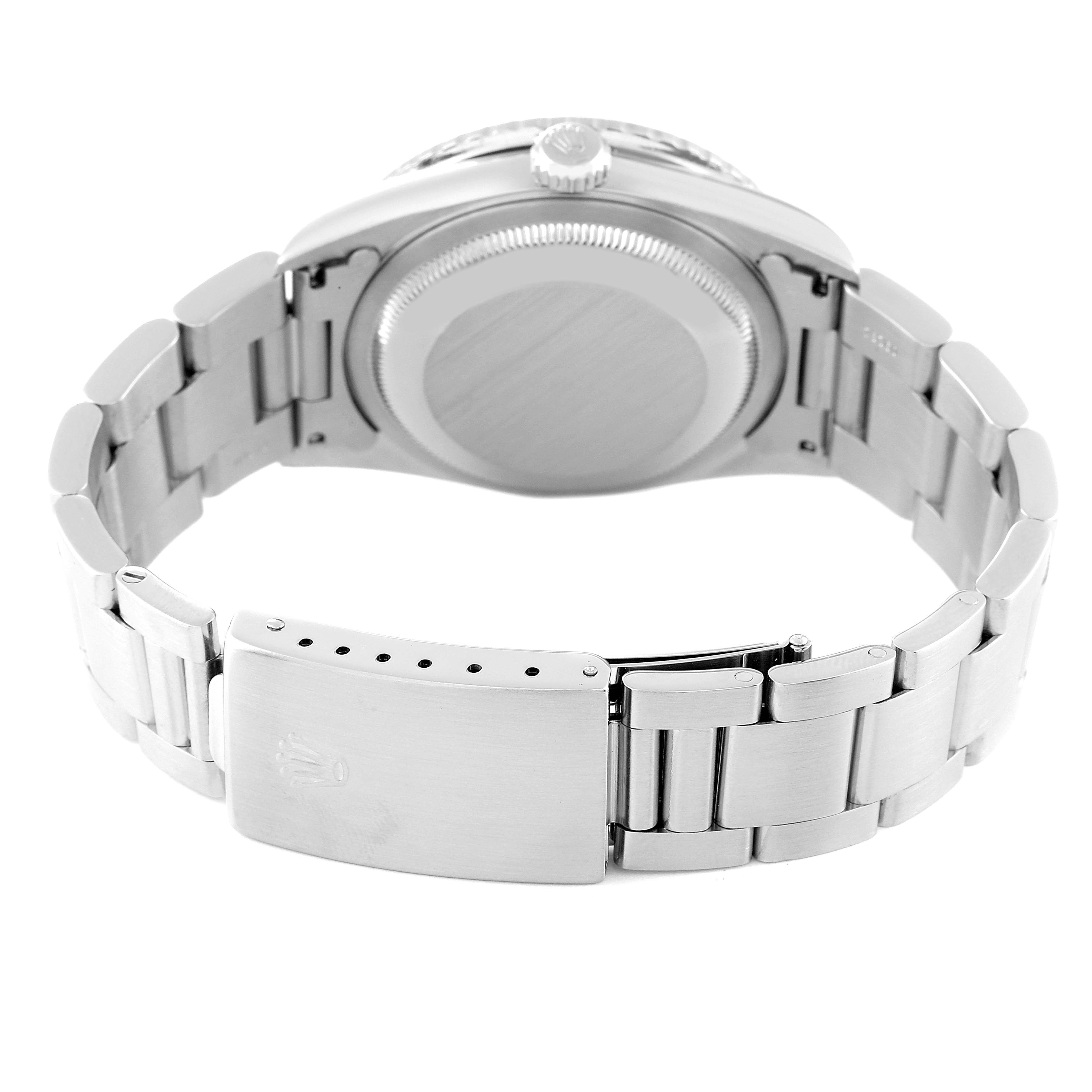 The image shows the backside of a Rolex Turn-o-Graph 16264 Men
s Stainless Steel Blue Dial 16264 Men
s Stainless Steel Blue Dial watch, including the case back, crown, and metal bracelet with the clasp.