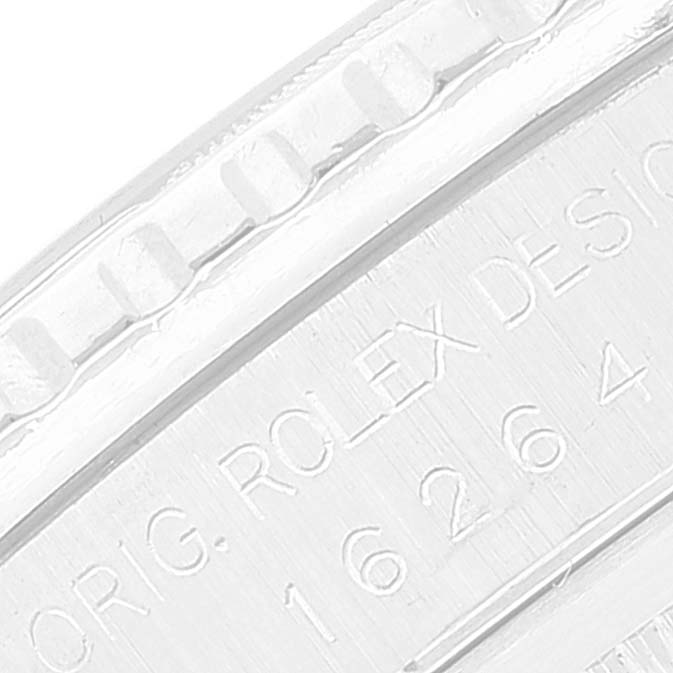 The image shows a close-up view of the edge of the bezel and the engraved serial/model number on a Rolex Turn-o-Graph 16264 Men
s Stainless Steel Blue Dial 16264 Men
s Stainless Steel Blue Dial watch.