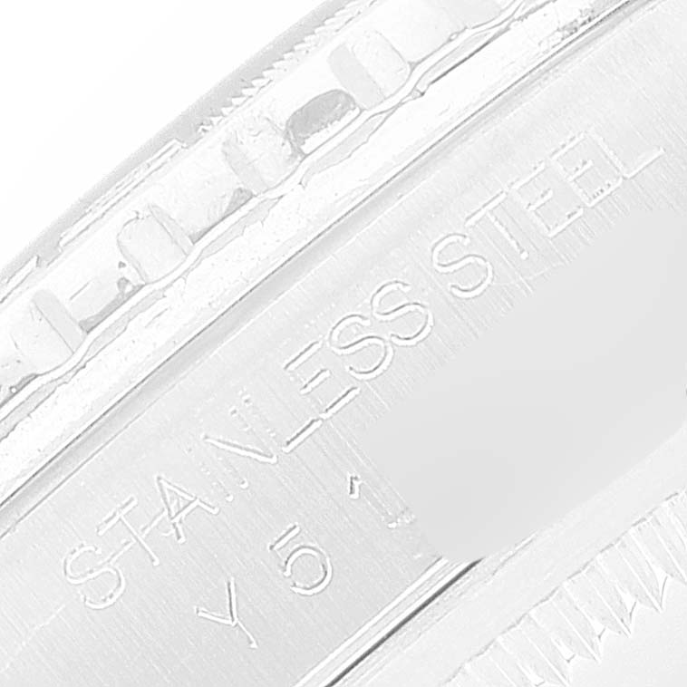 This image shows a close-up of the stainless steel case of a Rolex Turn-o-Graph 16264 Men
s Stainless Steel Blue Dial 16264 Men
s Stainless Steel Blue Dial watch, highlighting the engraved text.