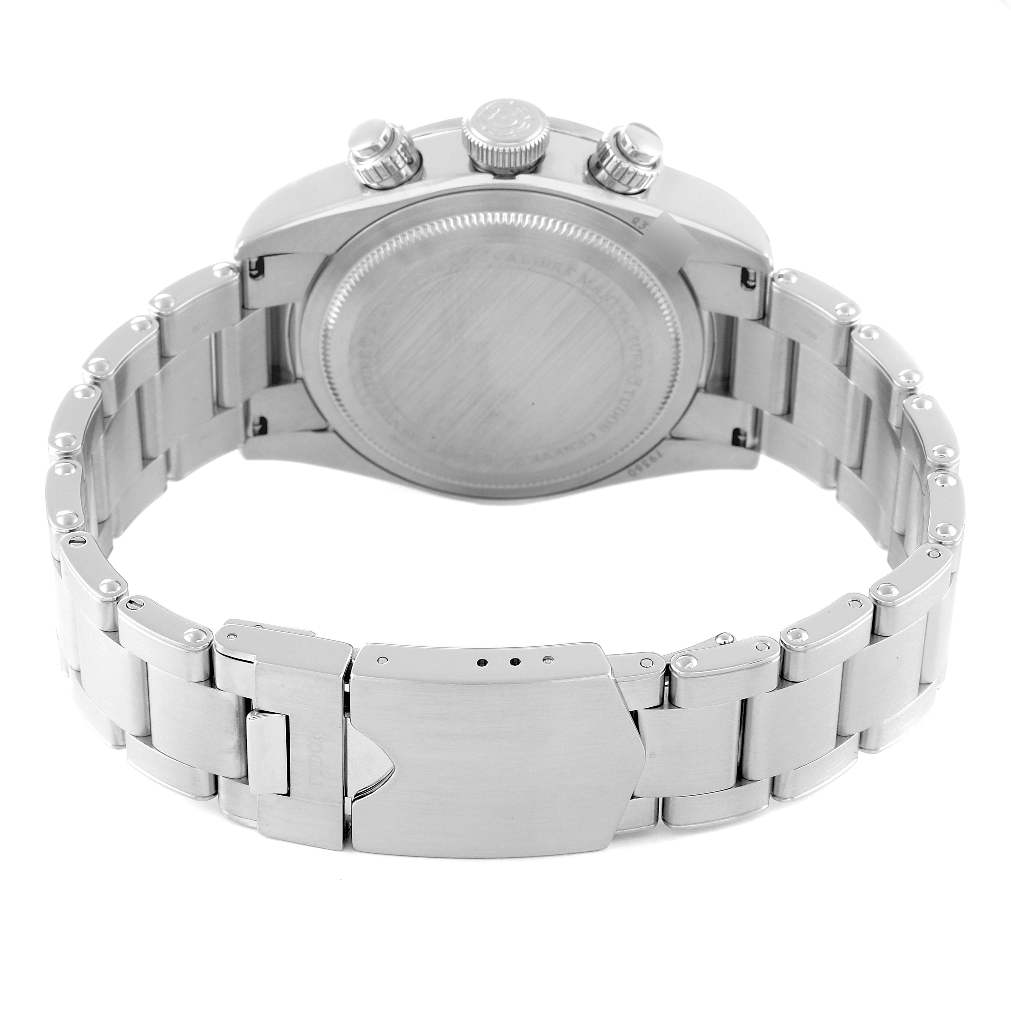 The image shows the back view of the Tudor Heritage Black Bay 79360N Men
s Stainless Steel White Dial 79360N Men
s Stainless Steel White Dial watch, highlighting its closed case back and stainless steel bracelet with a clasp.