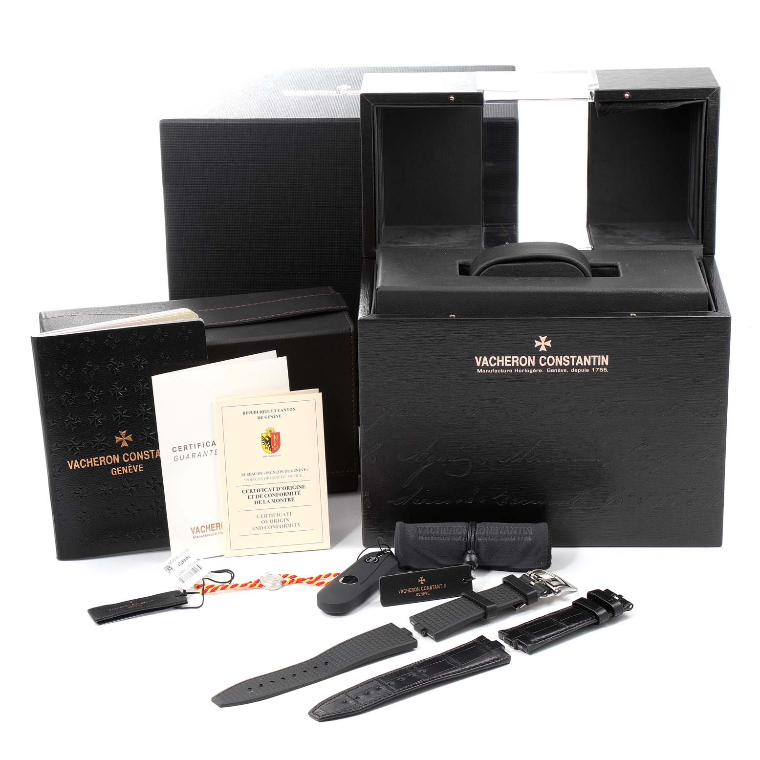 The image shows the Vacheron Constantin Overseas 4500V/110A-B126 Men
s Stainless Steel Silver Dial 4500V/110A-B126 Men
s Stainless Steel Silver Dial watch accessories, including boxes, straps, warranty, and manuals from a frontal angle.