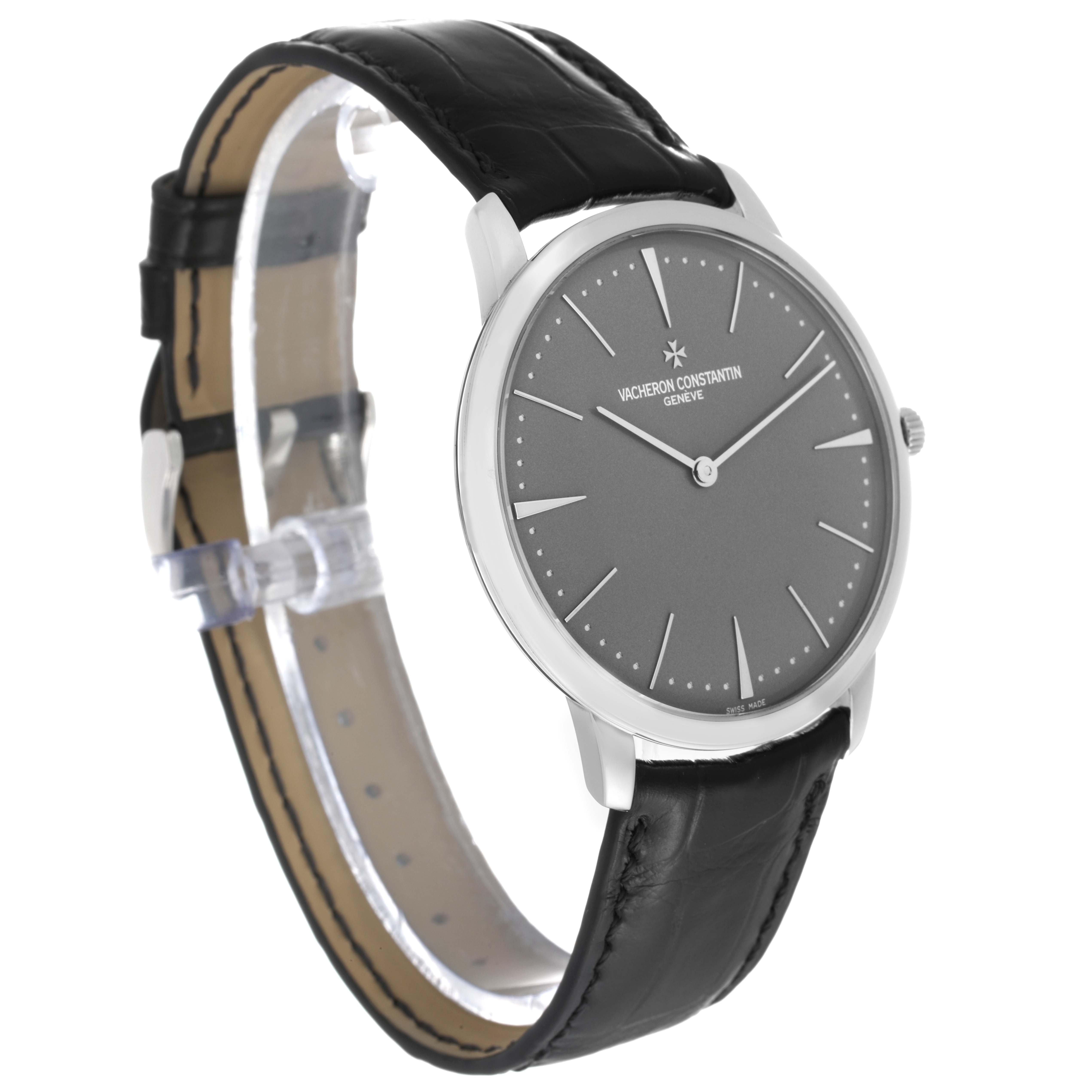 The Vacheron Constantin Patrimony 81180/000P-9539 Men's Platinum Grey Dial 81180/000P-9539 Men's Platinum Grey Dial watch is shown at a slight angle, highlighting the face, crown, and black leather strap.