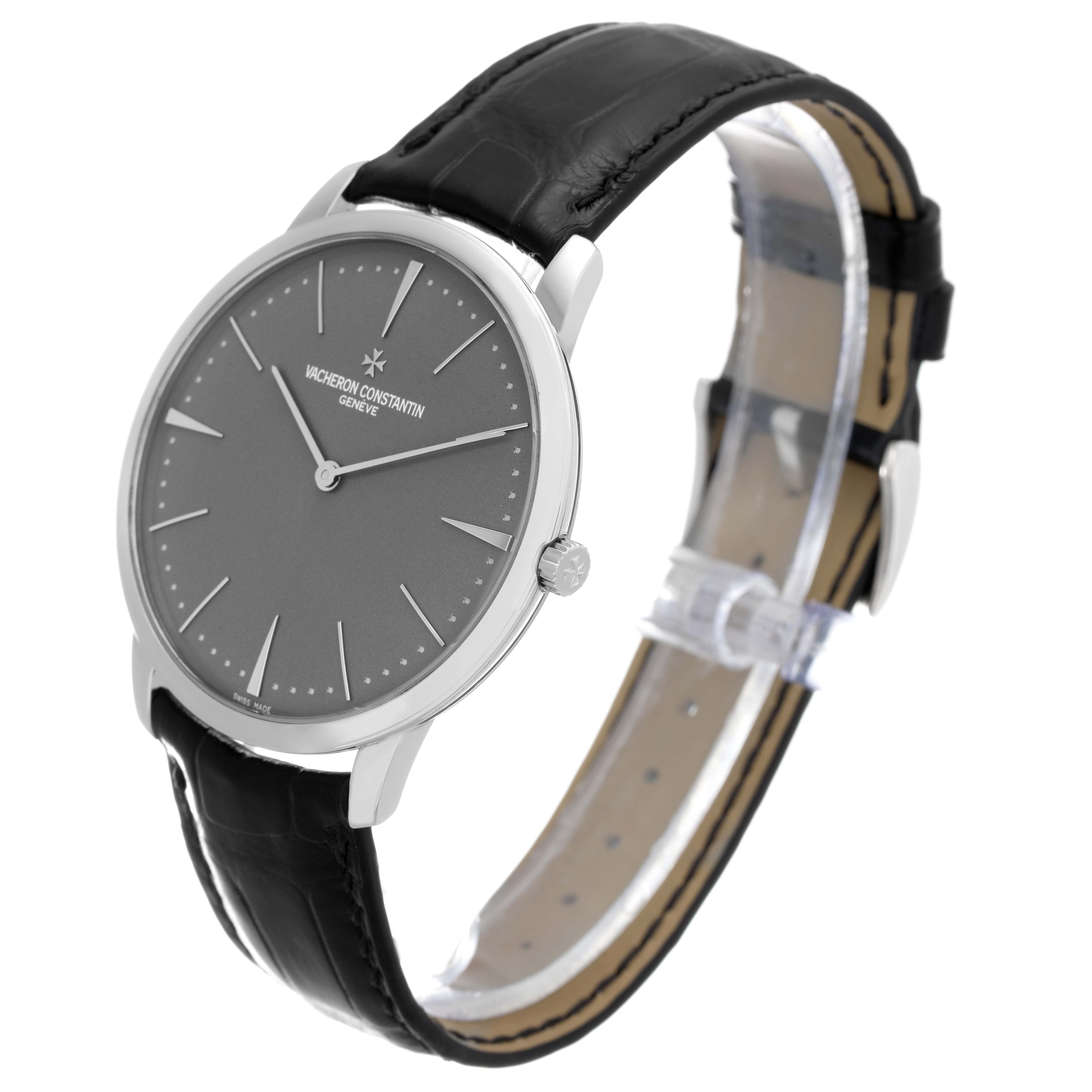 The Vacheron Constantin Patrimony 81180/000P-9539 Men's Platinum Grey Dial 81180/000P-9539 Men's Platinum Grey Dial watch is shown at an angle highlighting the dial, case, crown, and leather strap.