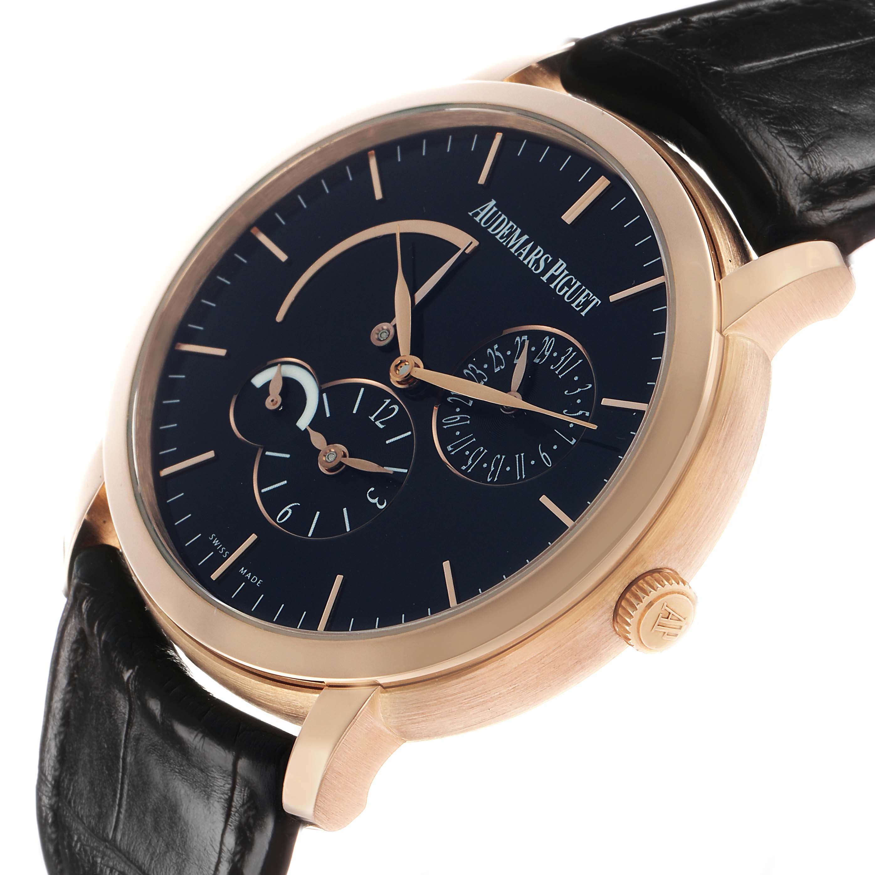 The image shows the Jules model by Audemars Piguet from an angled view, highlighting the watch face, crown, and leather strap.