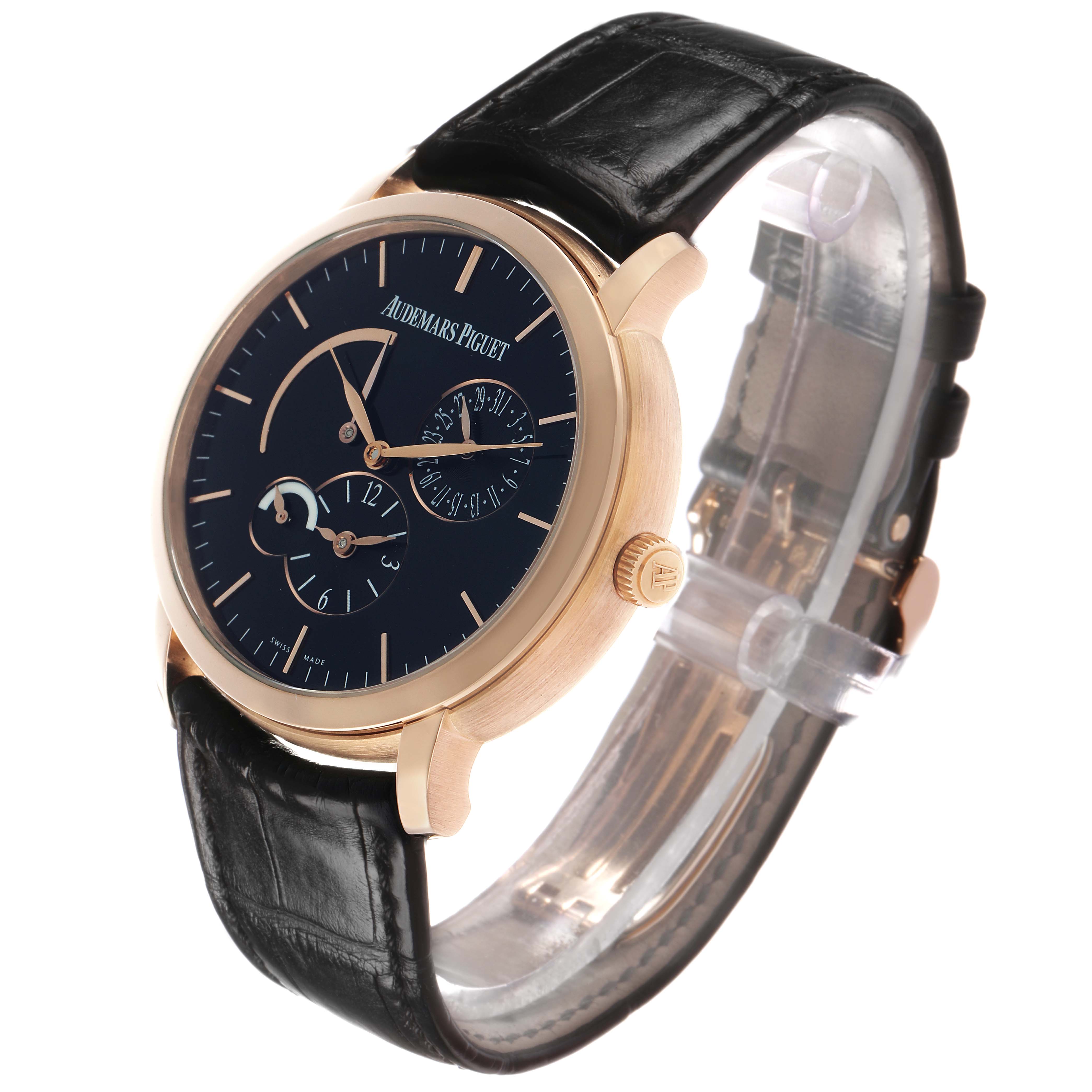 The Audemars Piguet Jules 26380OR Men's Rose Gold Black Dial watch is shown at an angle highlighting its face, crown, and black leather strap.