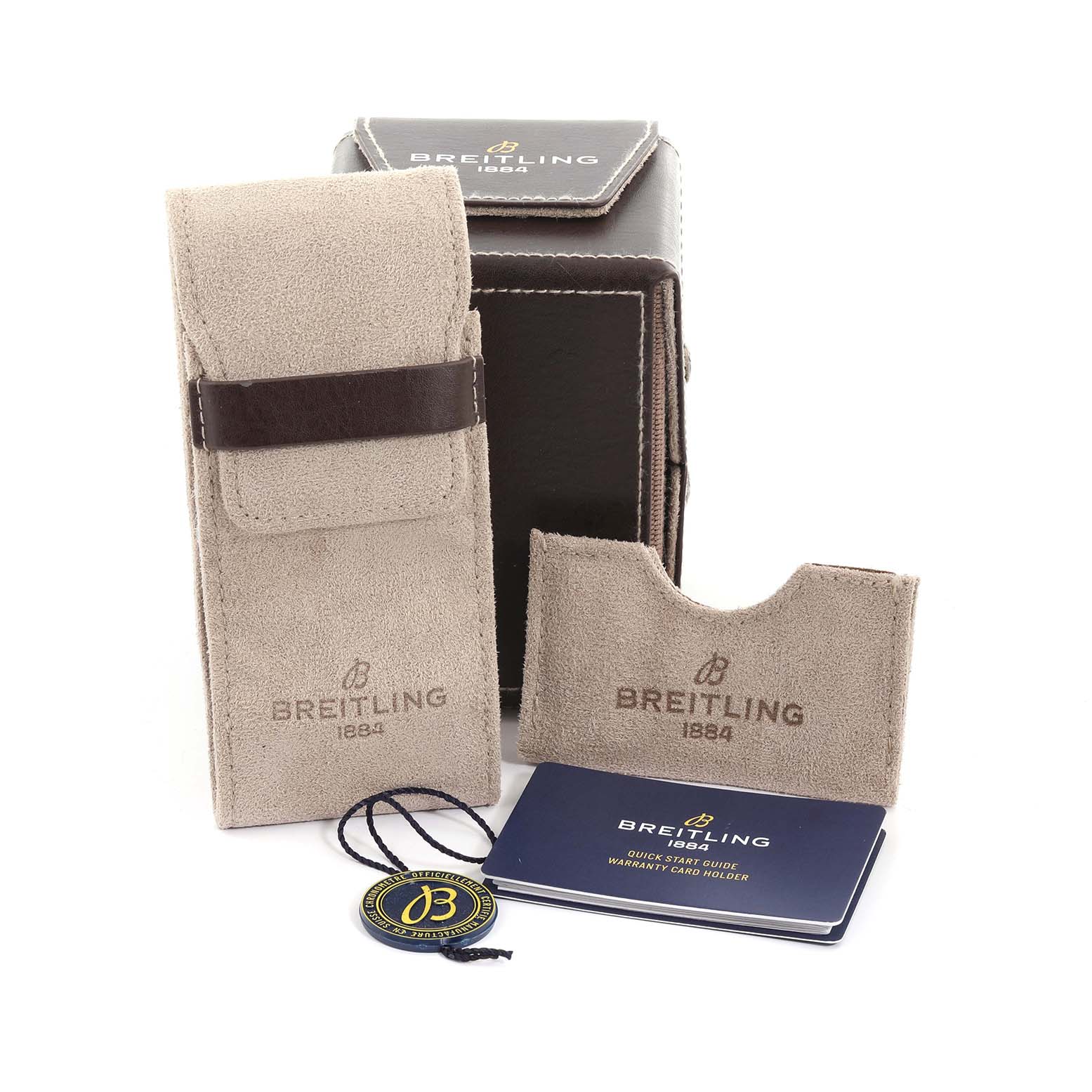 The image shows watch accessories for a Bentley model by Breitling, including a pouch, card holder, box, tag, and booklet.