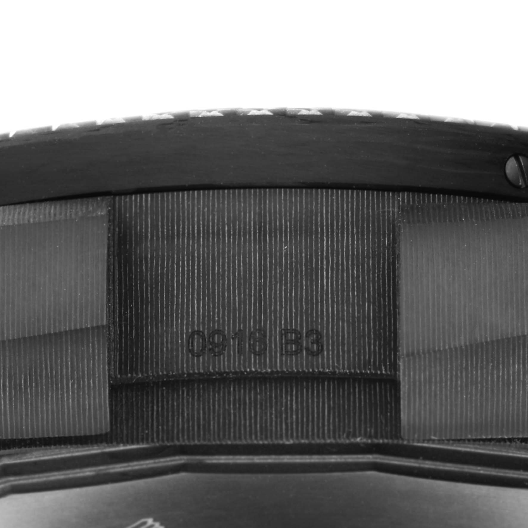 The image shows a side view of the Bentley by Breitling watch, focusing on the case and serial number.