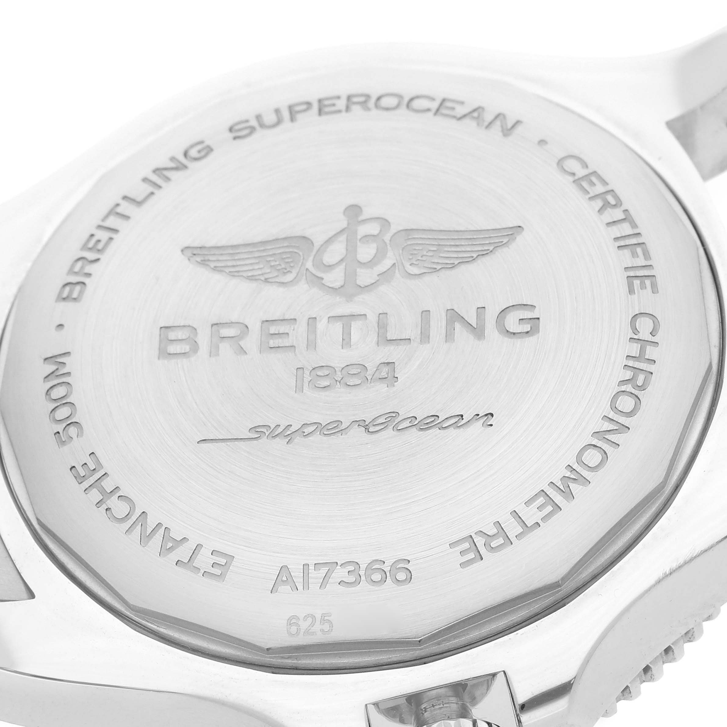 The image shows the case back of the Breitling Superocean A17366 Men's Stainless Steel Black Dial watch, highlighting its engraved branding and specifications.
