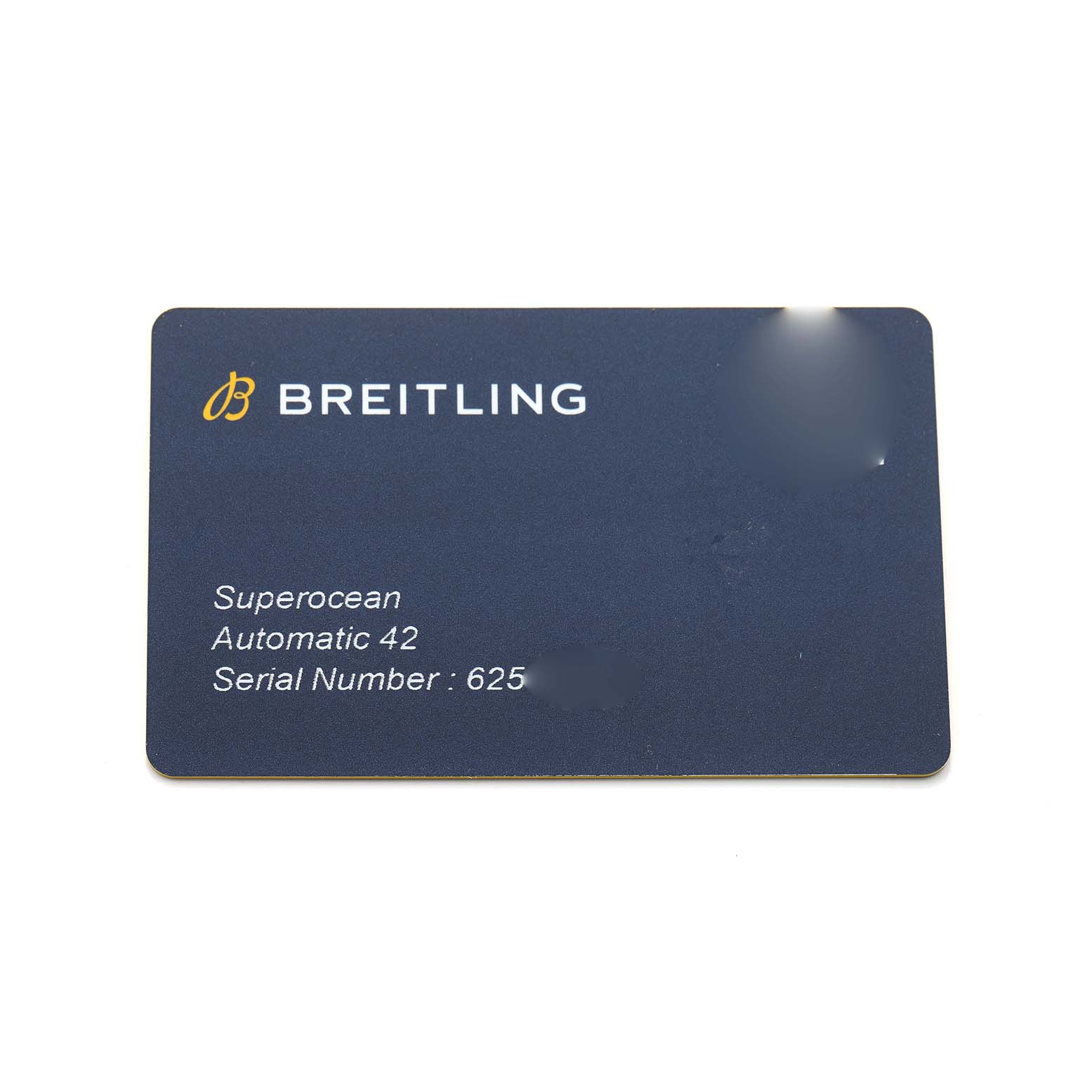 The image shows a warranty card for the Breitling Superocean A17366 Men's Stainless Steel Black Dial Automatic 42, featuring the brand logo and model details.
