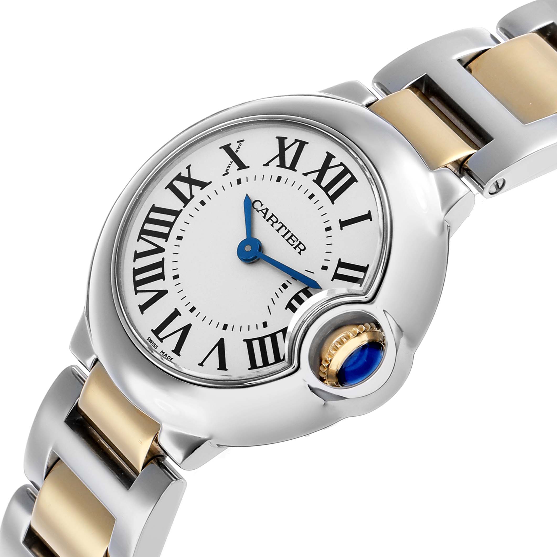 The Cartier Ballon Bleu W69007Z3 Women's Steel and Gold (two tone) Silver Dial watch is shown at an angled close-up, highlighting the dial, blue hands, crown, and part of the metal strap.