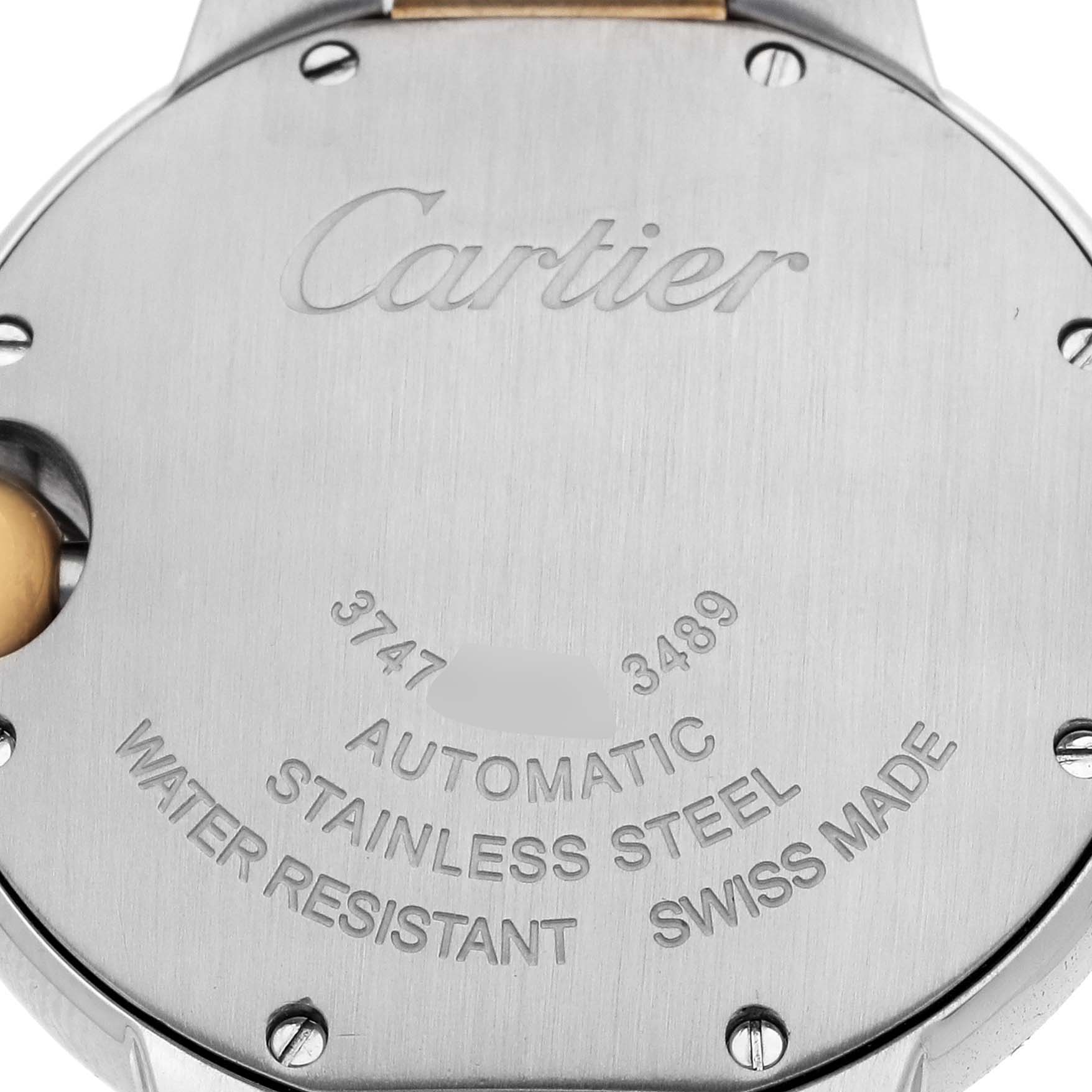 The image shows the back case of the Cartier Ballon Bleu W2BB0002 Women's Steel and Gold (two tone) Silver Dial watch, highlighting the engraving and material details.