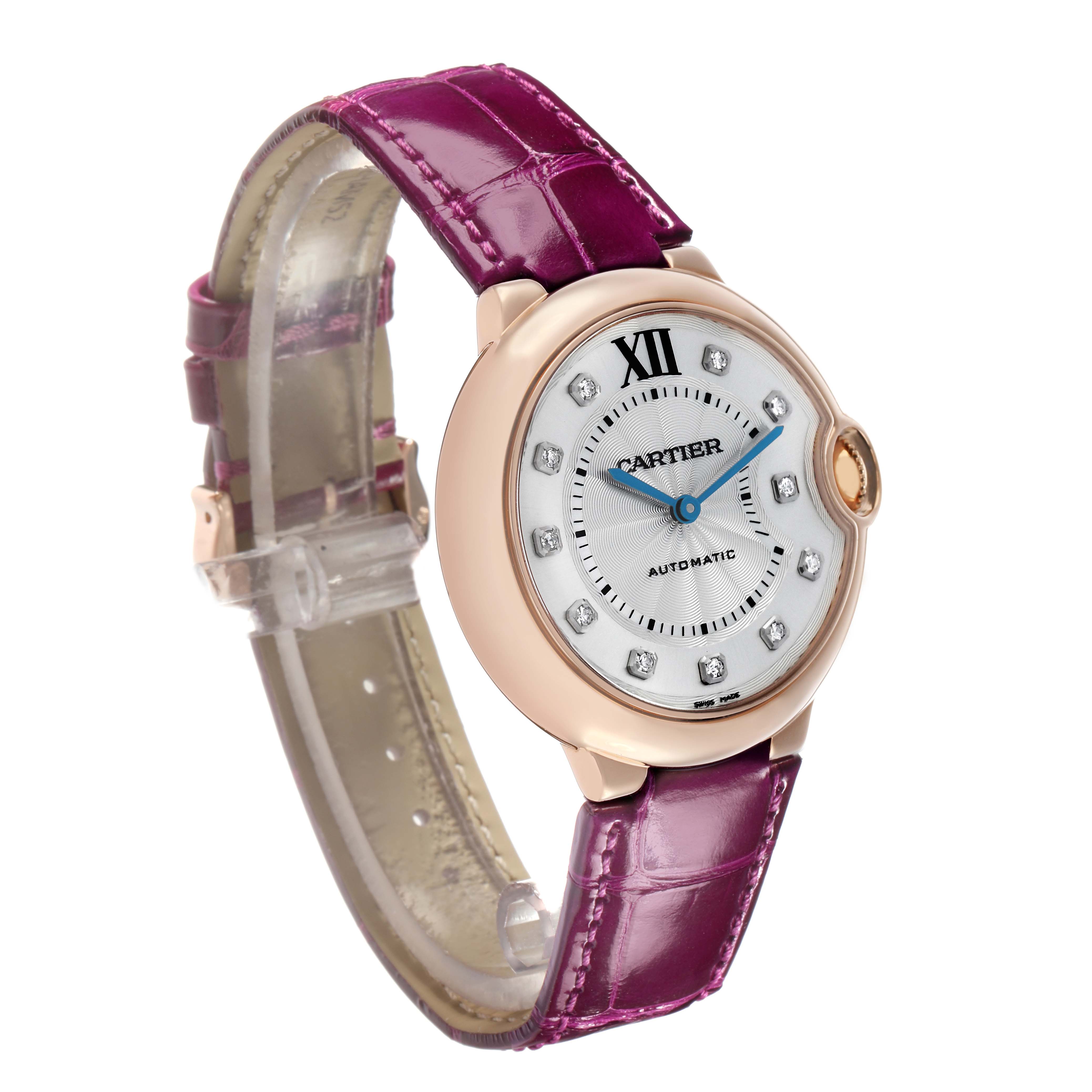 The Cartier Ballon Bleu WE902028 Women's Rose Gold Silver Dial watch is shown from an angled front view, highlighting the case, dial, and strap.