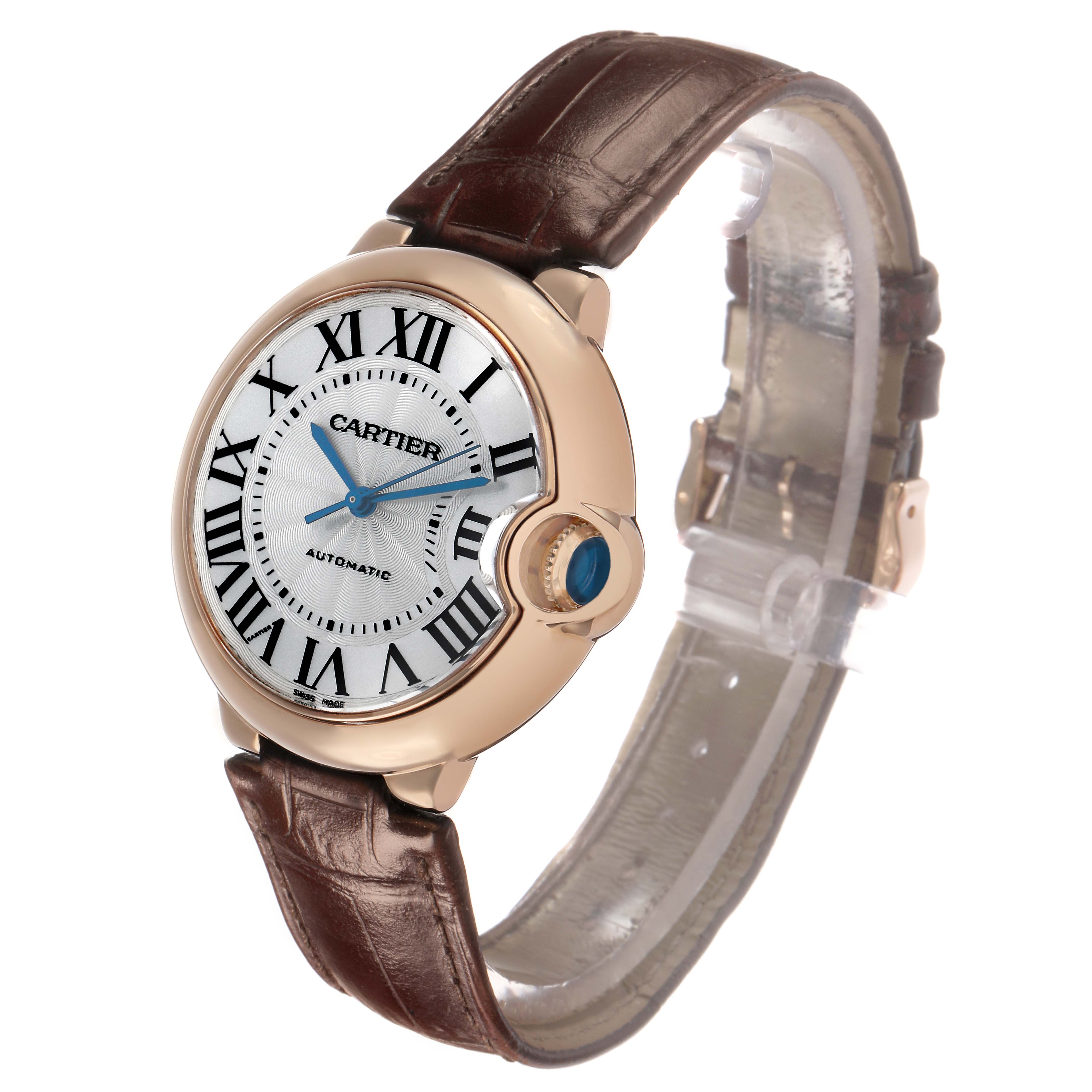 The Cartier Ballon Bleu WGBB0009 Women's Rose Gold Silver Dial watch is shown at a 3/4 angle, highlighting its round case, crown, and brown leather strap.