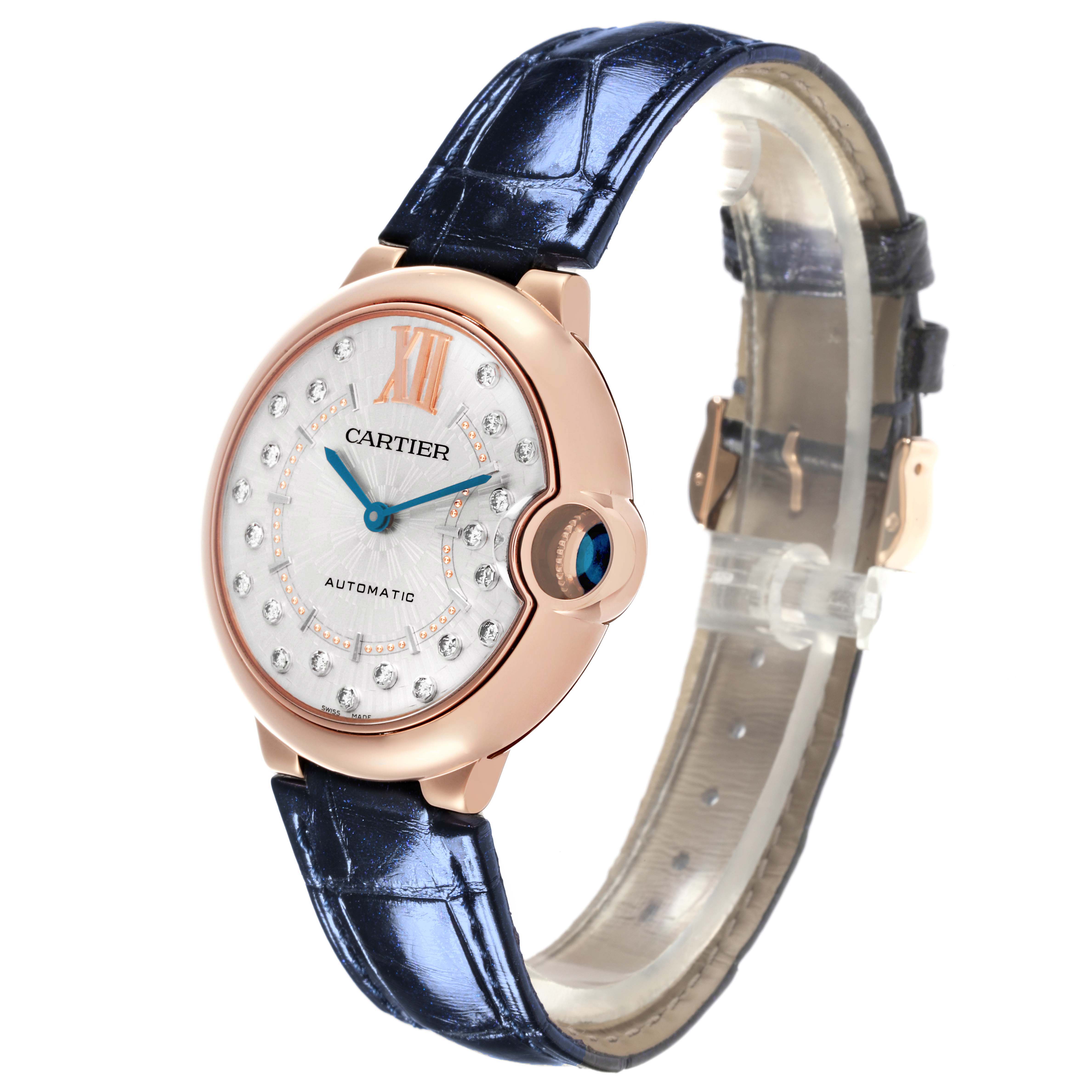 The Cartier Ballon Bleu WGBB0053 Women's Rose Gold Silver Dial WGBB0053 Women's Rose Gold Silver Dial watch is shown at a three-quarter angle, highlighting the face, case, and strap.