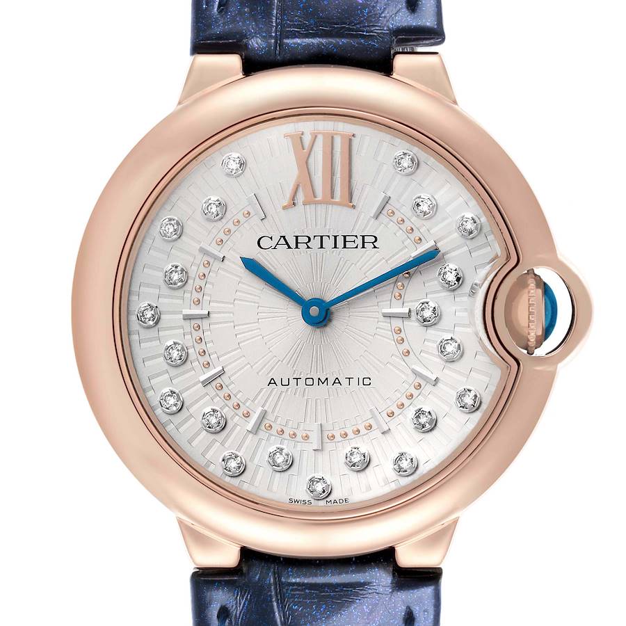 The image shows a frontal view of the Cartier Ballon Bleu watch, highlighting its dial, Roman numeral hour markers, and crown.