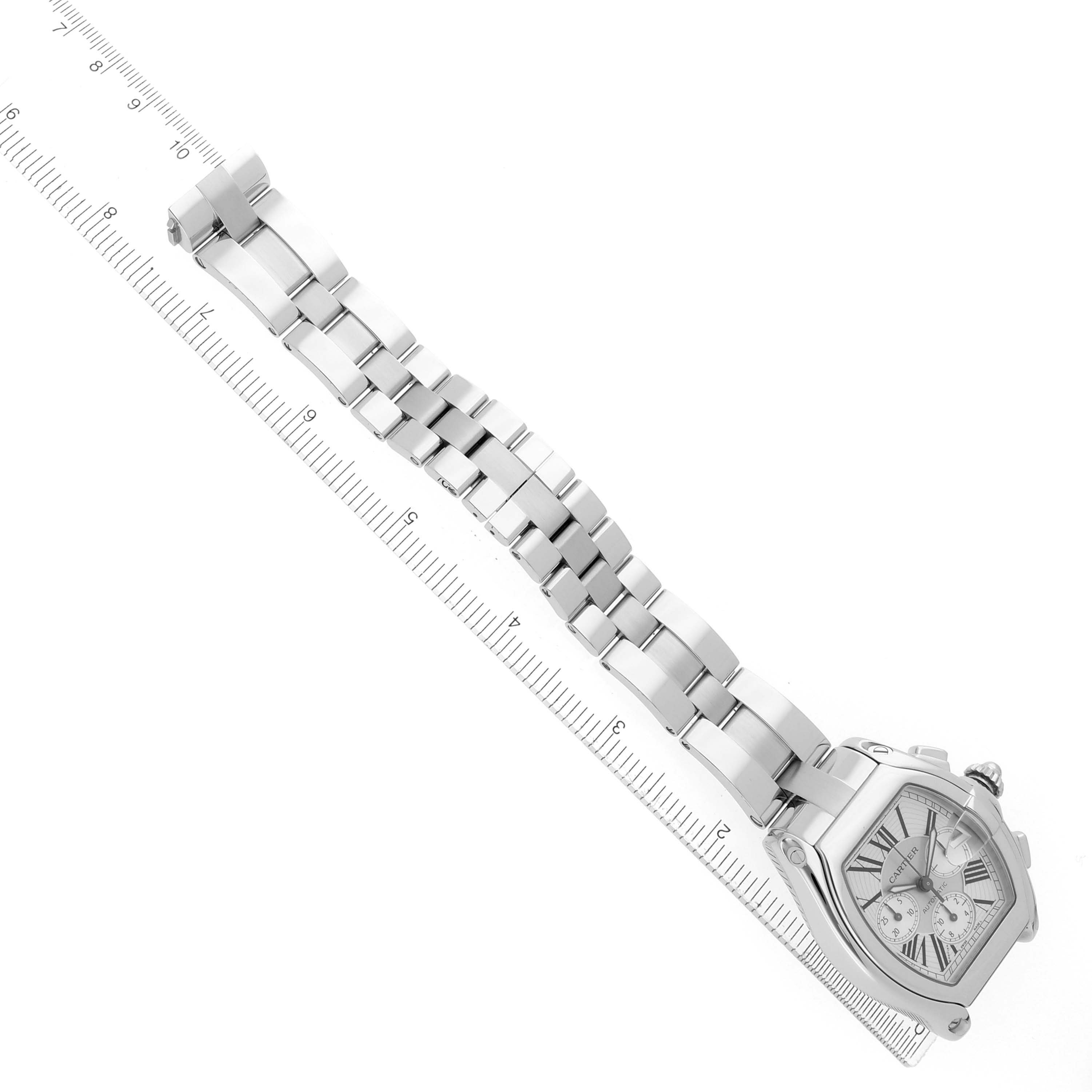 The Cartier Roadster W62019X6 Men's Stainless Steel Silver Dial watch is shown from an overhead angle, displaying the full bracelet and dial.
