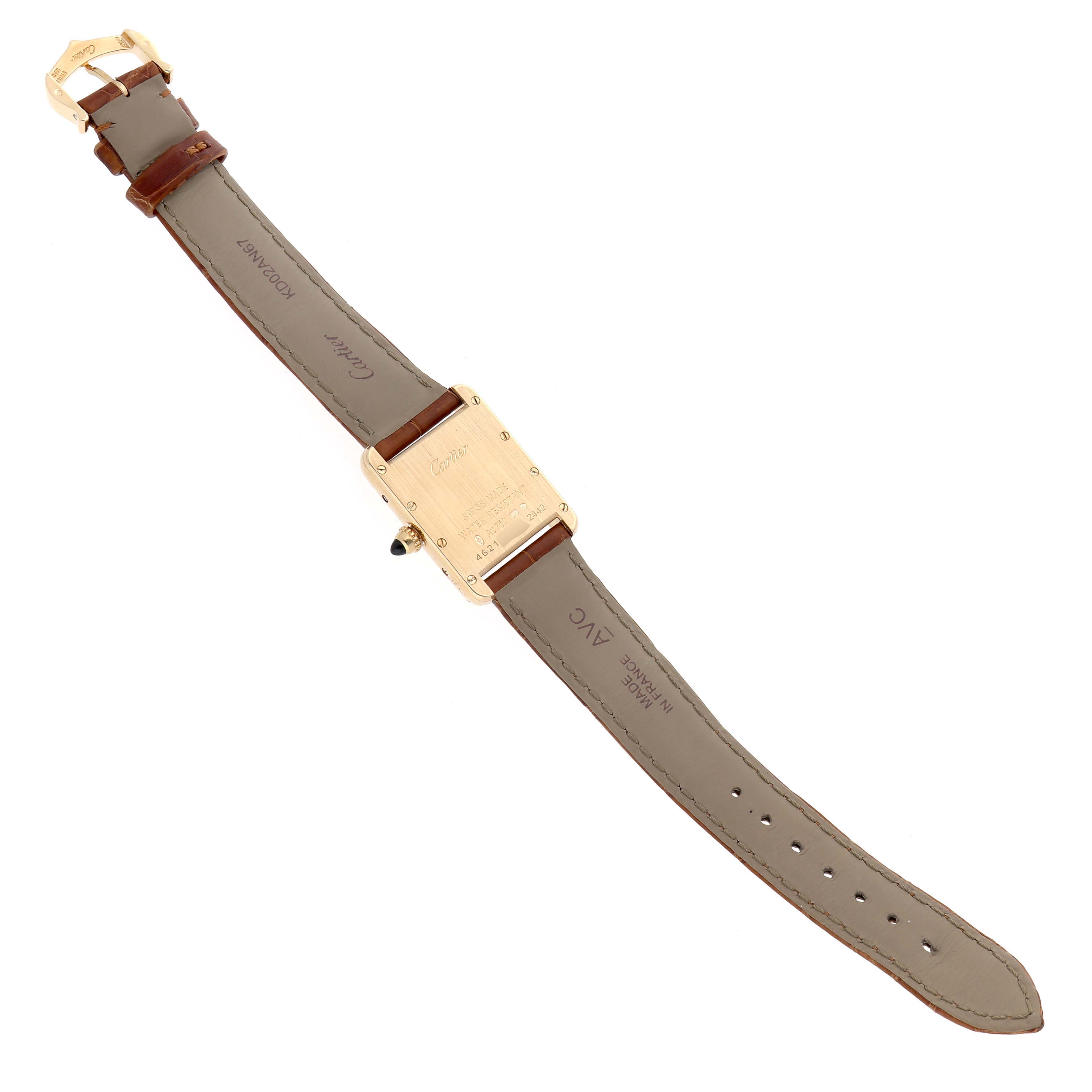 The image shows the back and strap of a Cartier Tank Louis W1529856 Women's Yellow Gold Silver Dial watch, highlighting the buckle and case back.