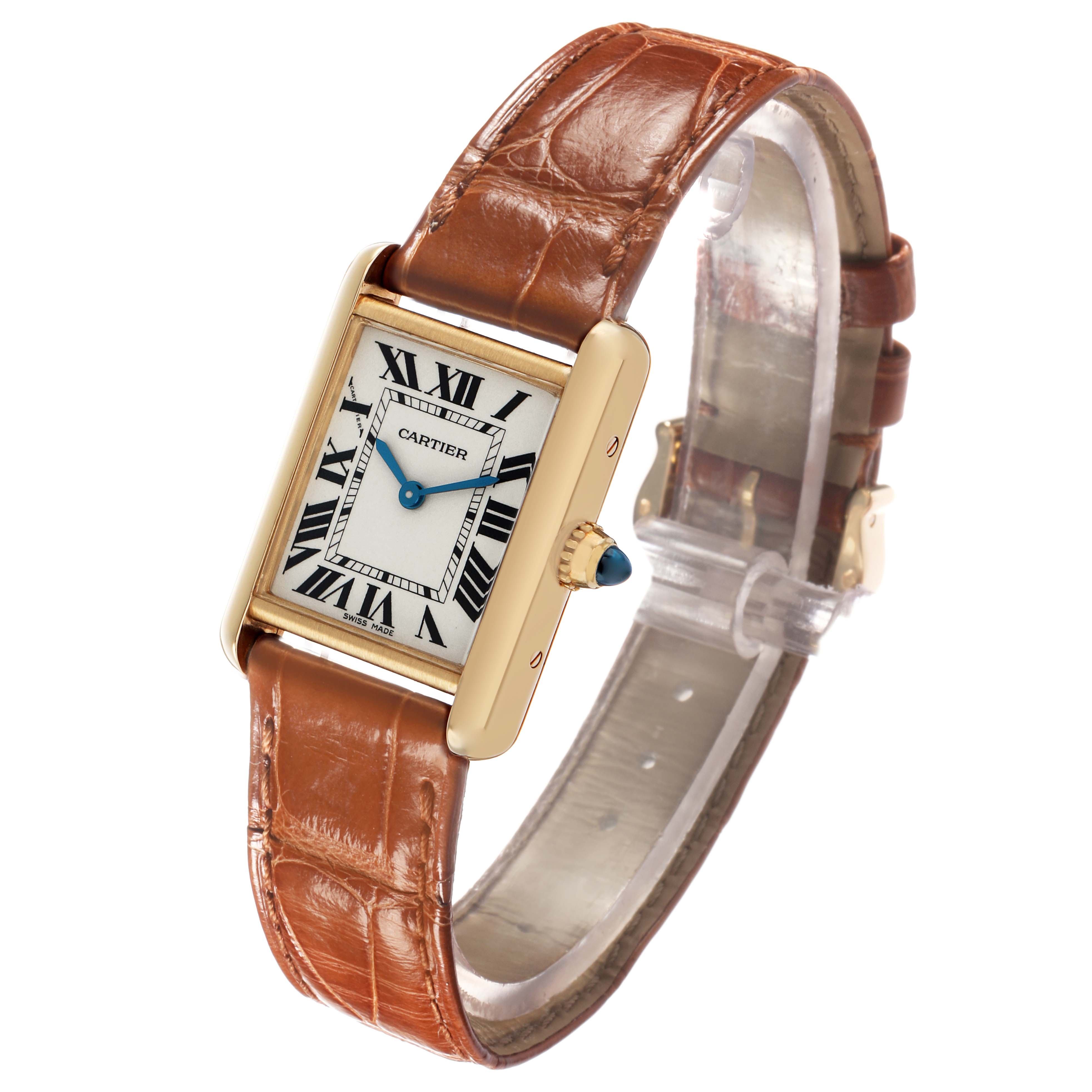 The Cartier Tank Louis W1529856 Women's Yellow Gold Silver Dial watch is shown at an angled side view, displaying its face, blue hands, Roman numerals, and brown leather strap.