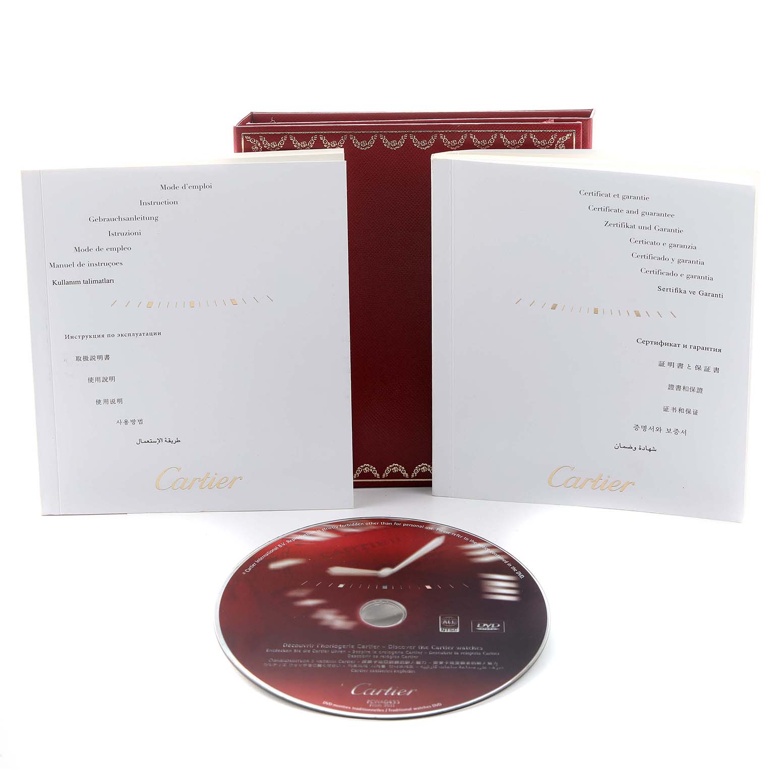 The image shows the instruction manual, warranty certificate, and a CD for the Cartier Tank Louis W1529856 Women's Yellow Gold Silver Dial watch, along with a red box.