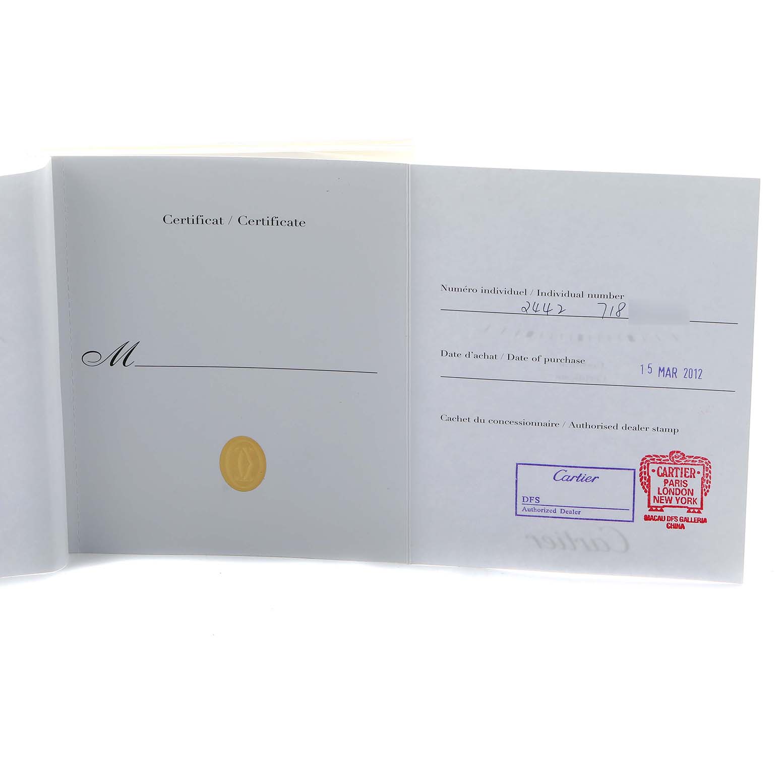 The image shows the certificate for a Cartier Tank Louis W1529856 Women's Yellow Gold Silver Dial watch, displaying purchase details and dealer stamps.