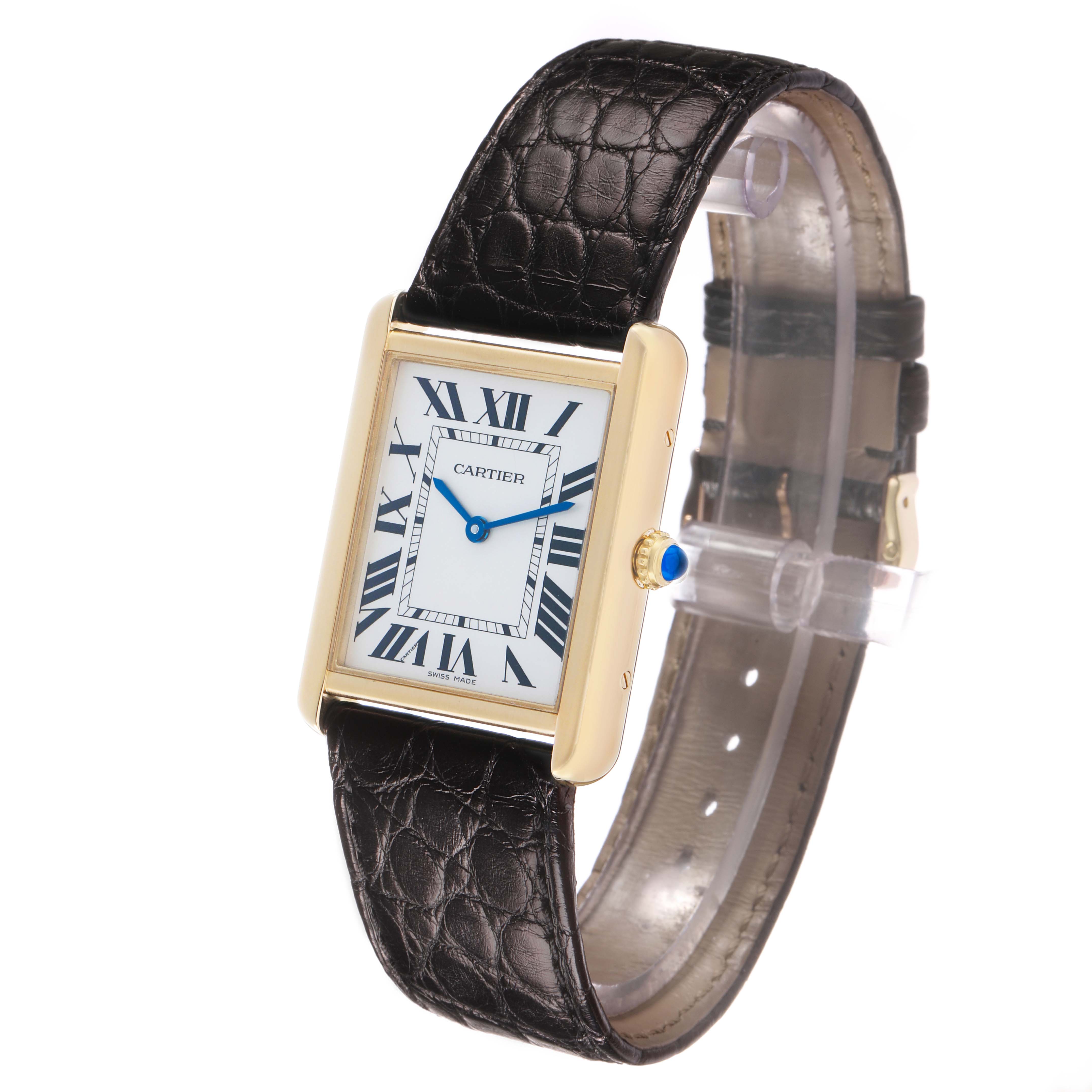 The Cartier Tank Solo W5200004 Men's Yellow Gold Silver Dial watch is shown at a three-quarter angle, highlighting the rectangular face, Roman numerals, and leather strap.