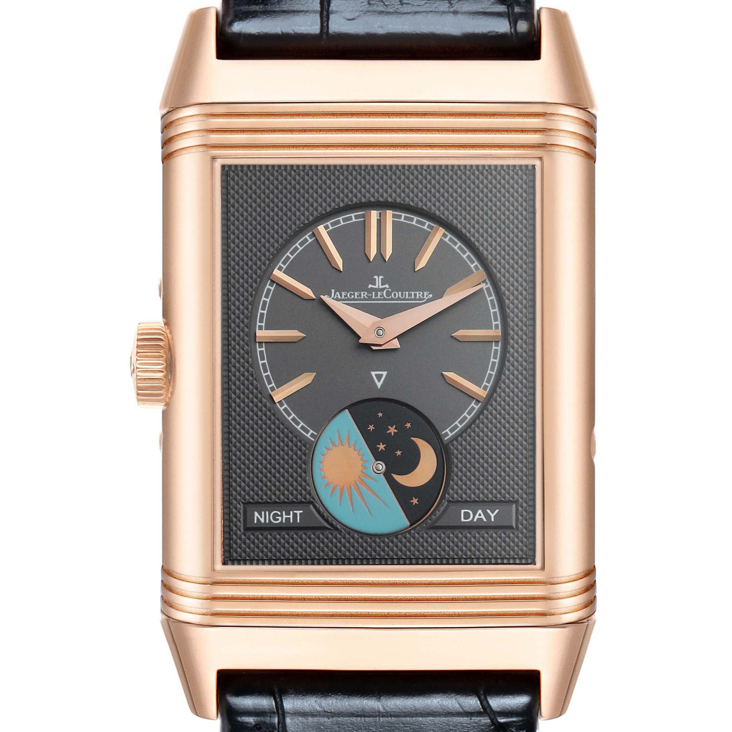 The Jaeger-LeCoultre Reverso watch is shown from the front, featuring its rectangular face and day-night indicator.