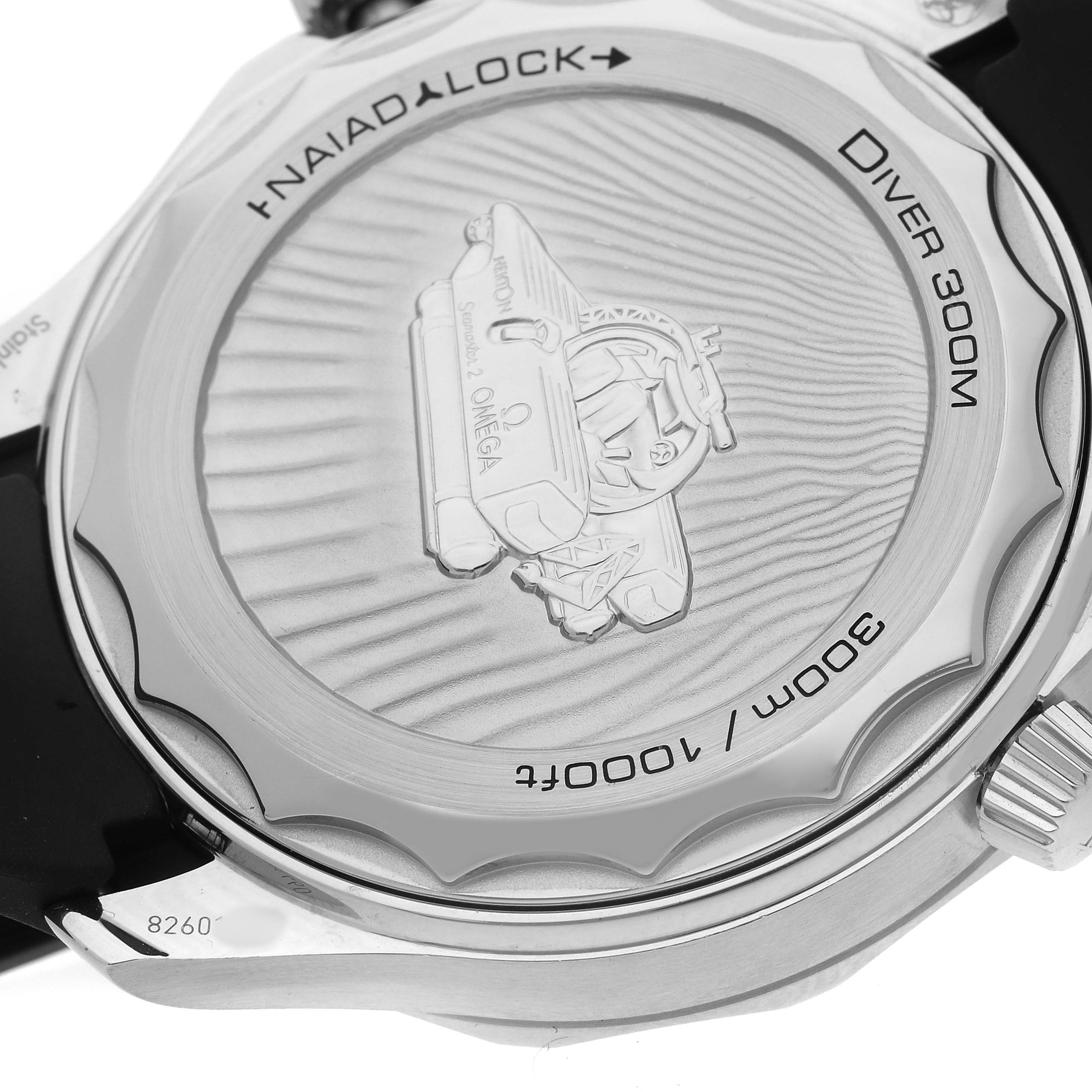 The image shows the back of the Omega Seamaster 210.32.42.20.01.002 Men's Stainless Steel Black Dial Diver 300M, highlighting the engraved design and Naiad Lock system.