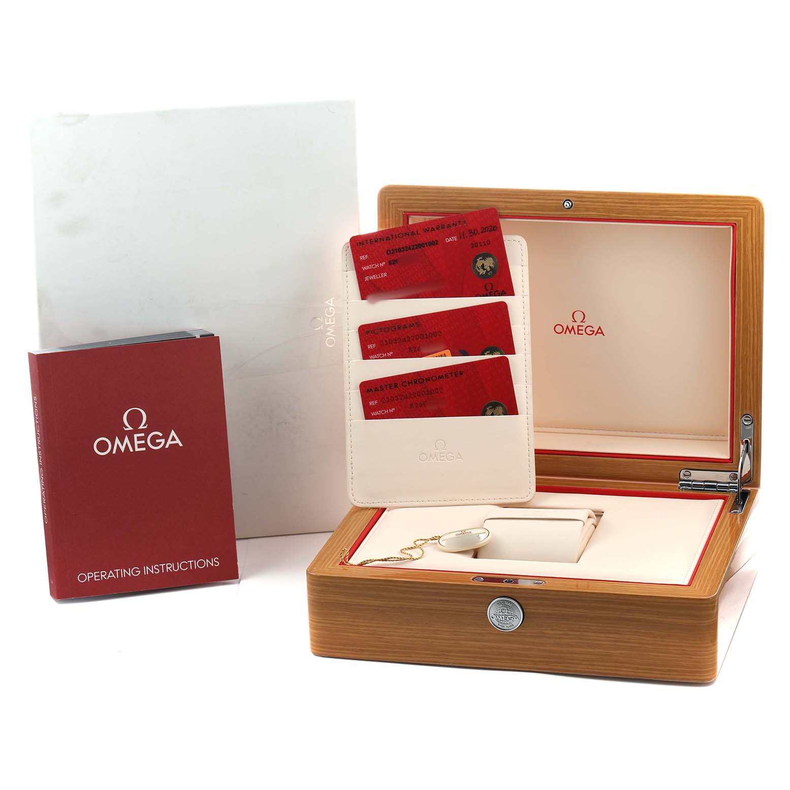 The image shows an Omega Seamaster 210.32.42.20.01.002 Men's Stainless Steel Black Dial wooden box, warranty cards, and operating instructions, all viewed from a front angle.