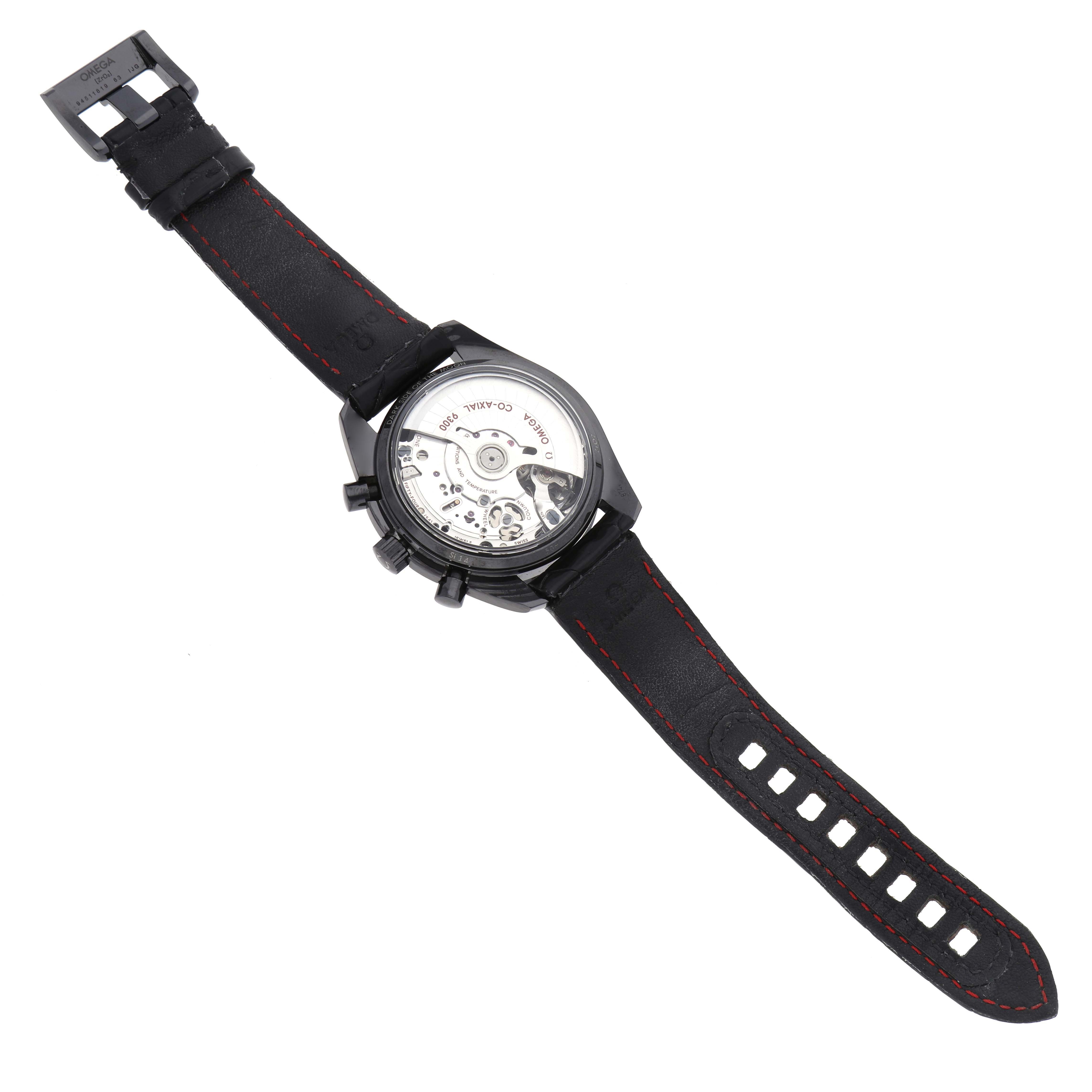 The Omega Speedmaster 311.92.44.51.01.003 Men's Ceramic Black Dial is shown from the back, displaying its transparent case back and black strap with red stitching.