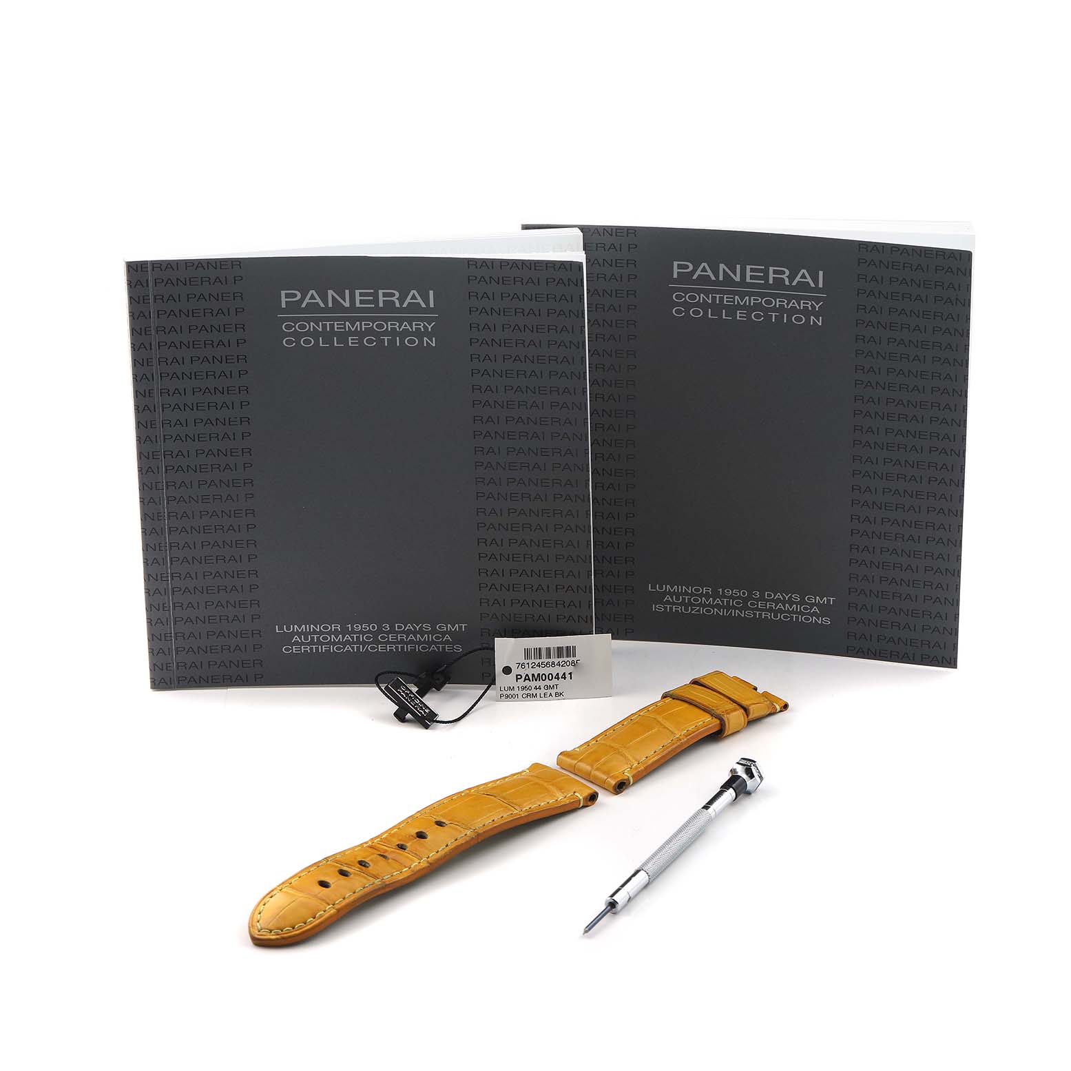 The image shows Panerai Luminor PAM00441 Men's Ceramic Black Dial accessories, including straps, a tool, and manuals, viewed from above.