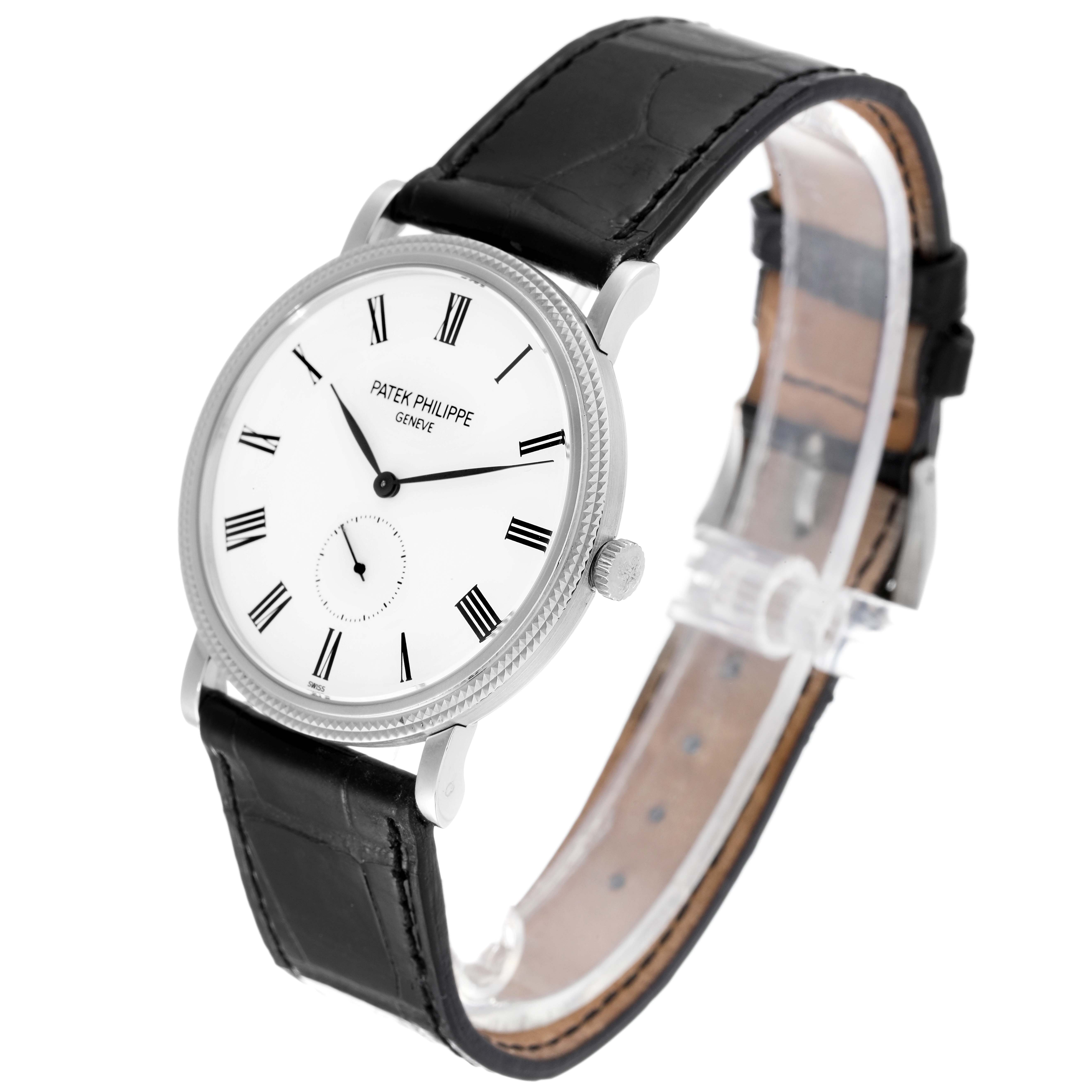 The image shows a side angle view of the Patek Philippe Calatrava 5119G Men's White Gold White Dial 5119G Men's White Gold White Dial watch, highlighting its face, bezel, crown, and leather strap.