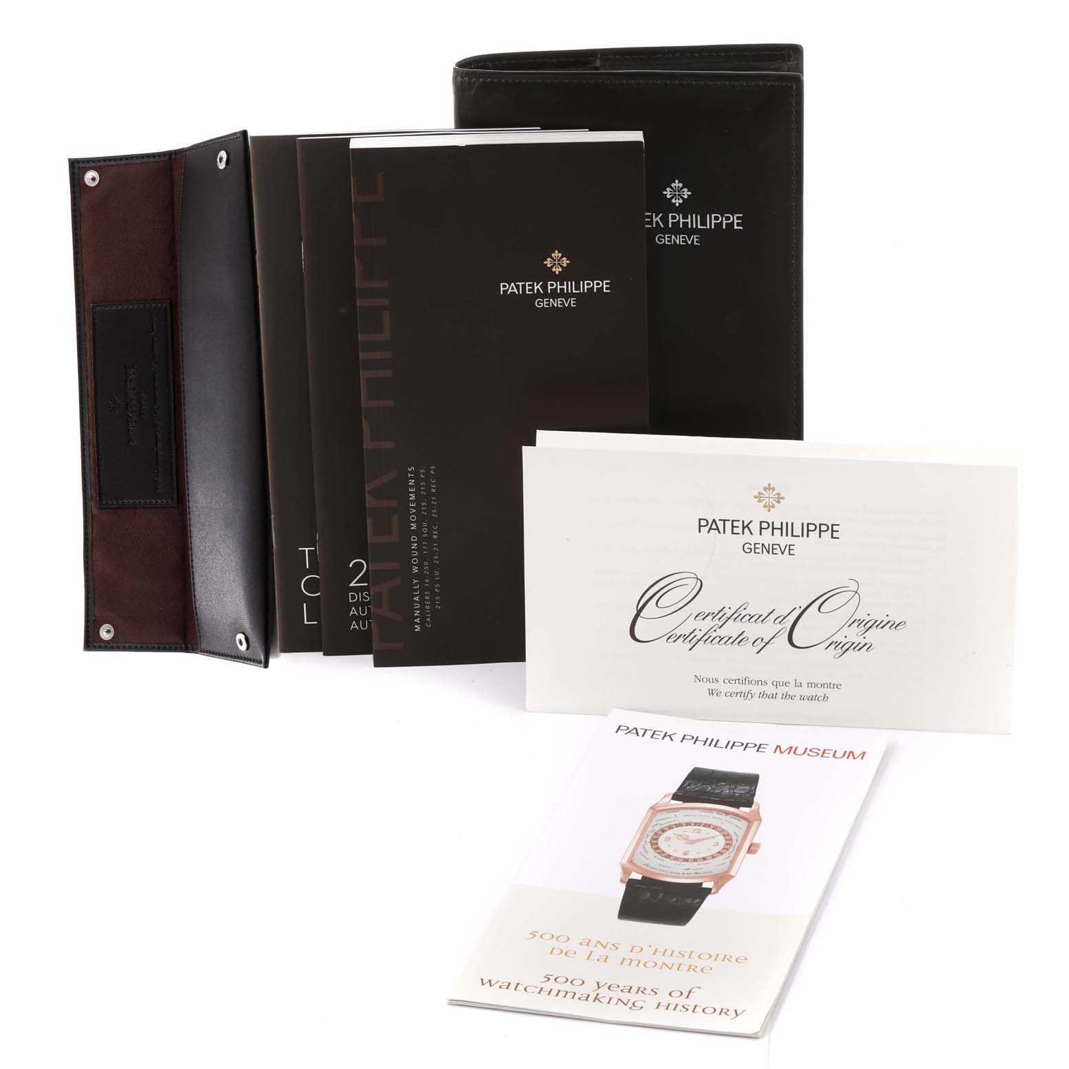 The image shows the documentation, certificate, and leather pouch for a Patek Philippe Calatrava 5119G Men's White Gold White Dial 5119G Men's White Gold White Dial watch.