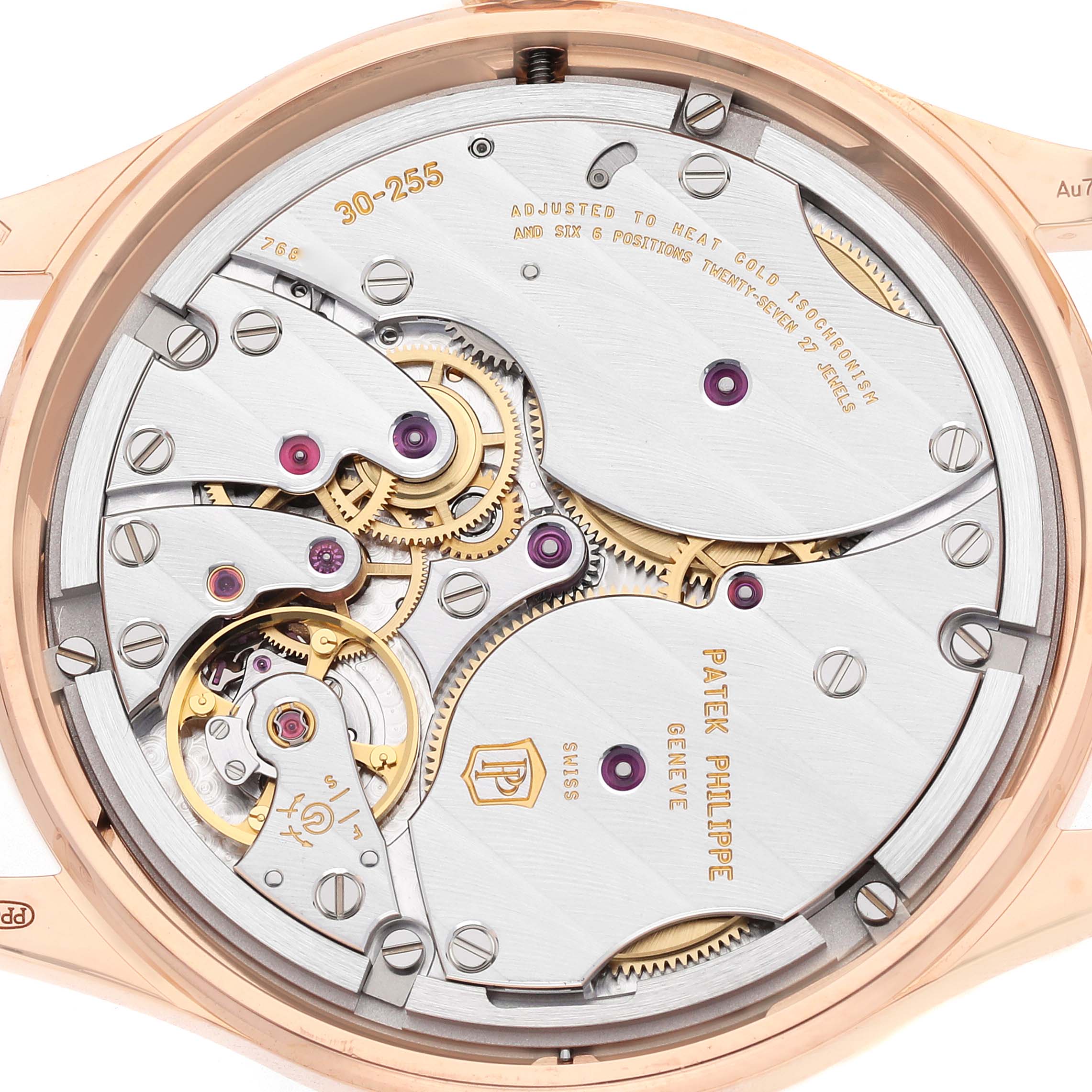 This image shows the back view of a Patek Philippe Calatrava 6119R-001 Men's Rose Gold Silver Dial, highlighting its intricate movement and mechanisms.