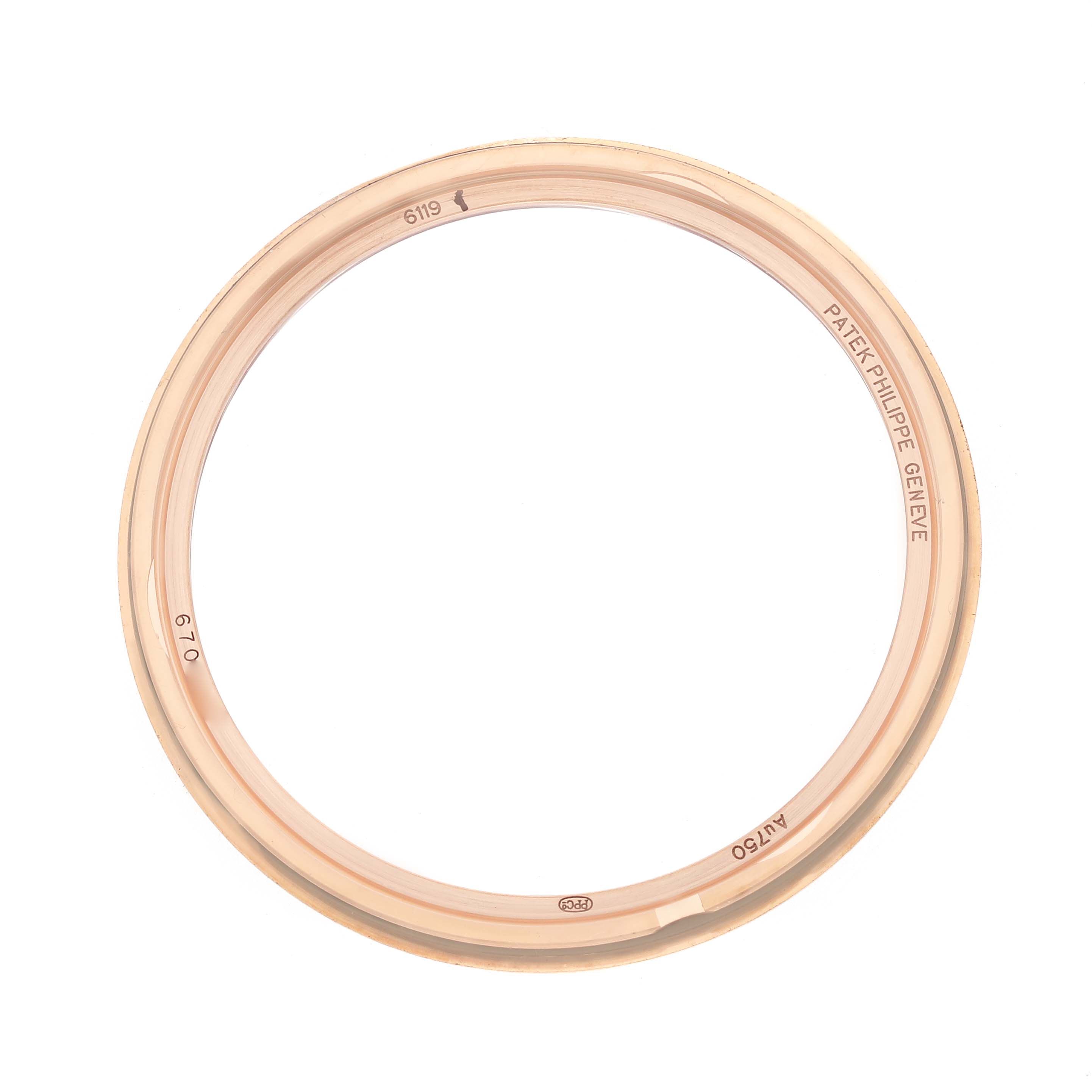 The image shows a top-down view of a Patek Philippe Calatrava 6119R-001 Men's Rose Gold Silver Dial watch bezel.