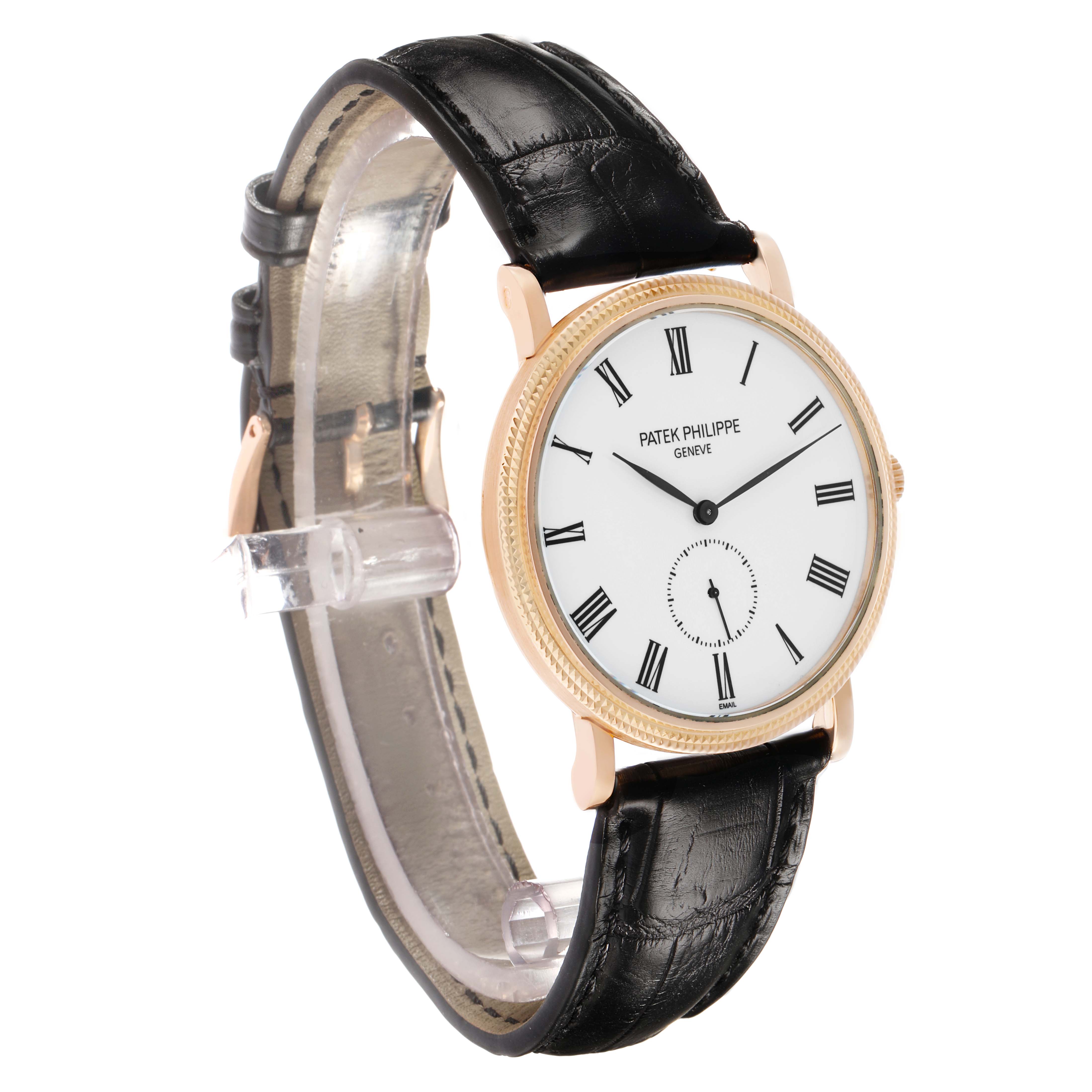 The Patek Philippe Calatrava 5116R Men's Rose Gold White Dial watch is shown at a slight angle, displaying the face, case, and black leather strap.