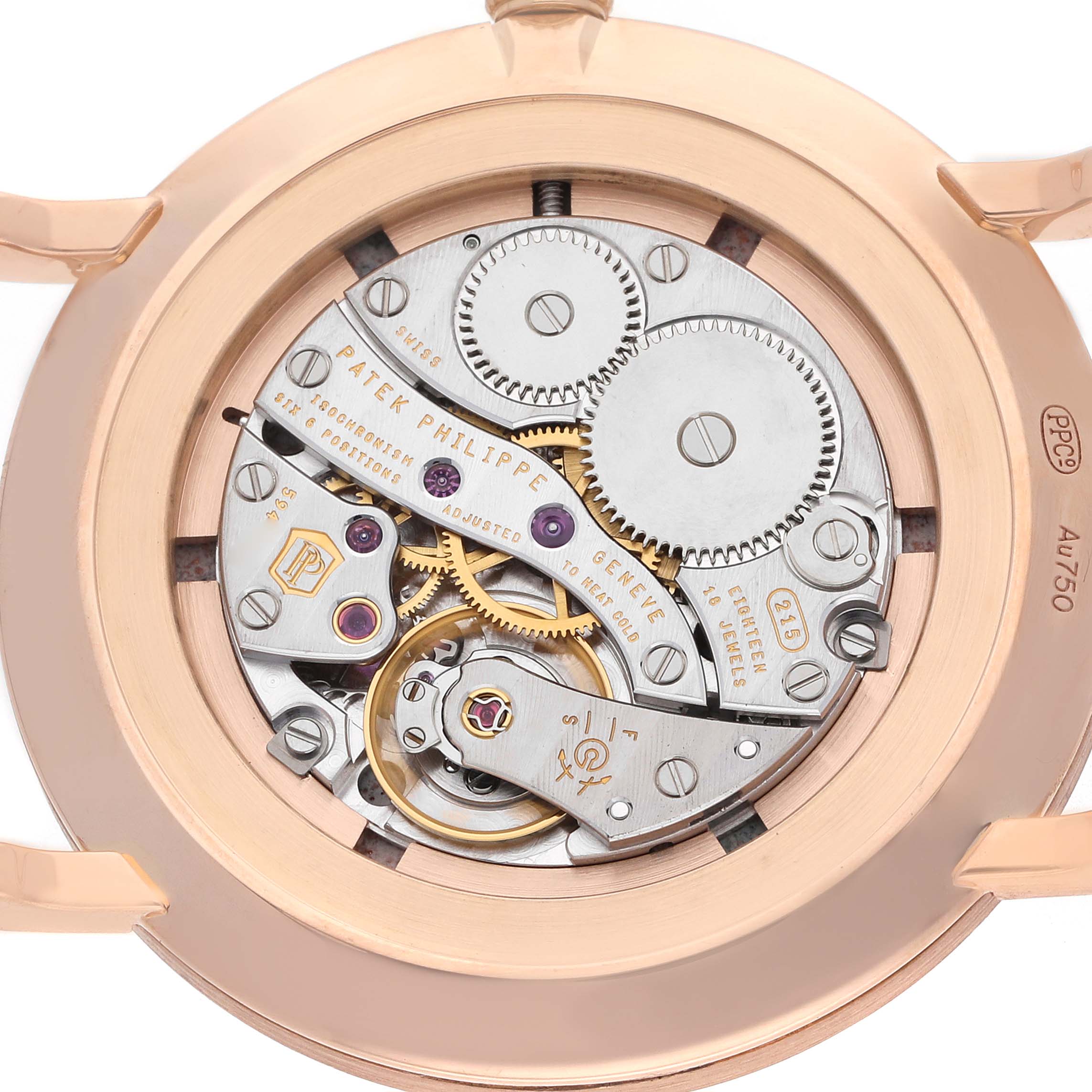 The image shows the back of a Patek Philippe Calatrava 5116R Men's Rose Gold White Dial, highlighting the intricate movement and gears.