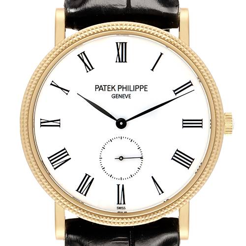 The image shows a front view of the Patek Philippe Calatrava 5119J Men's Yellow Gold White Dial watch, highlighting the Roman numeral dial, gold case, and black leather strap.