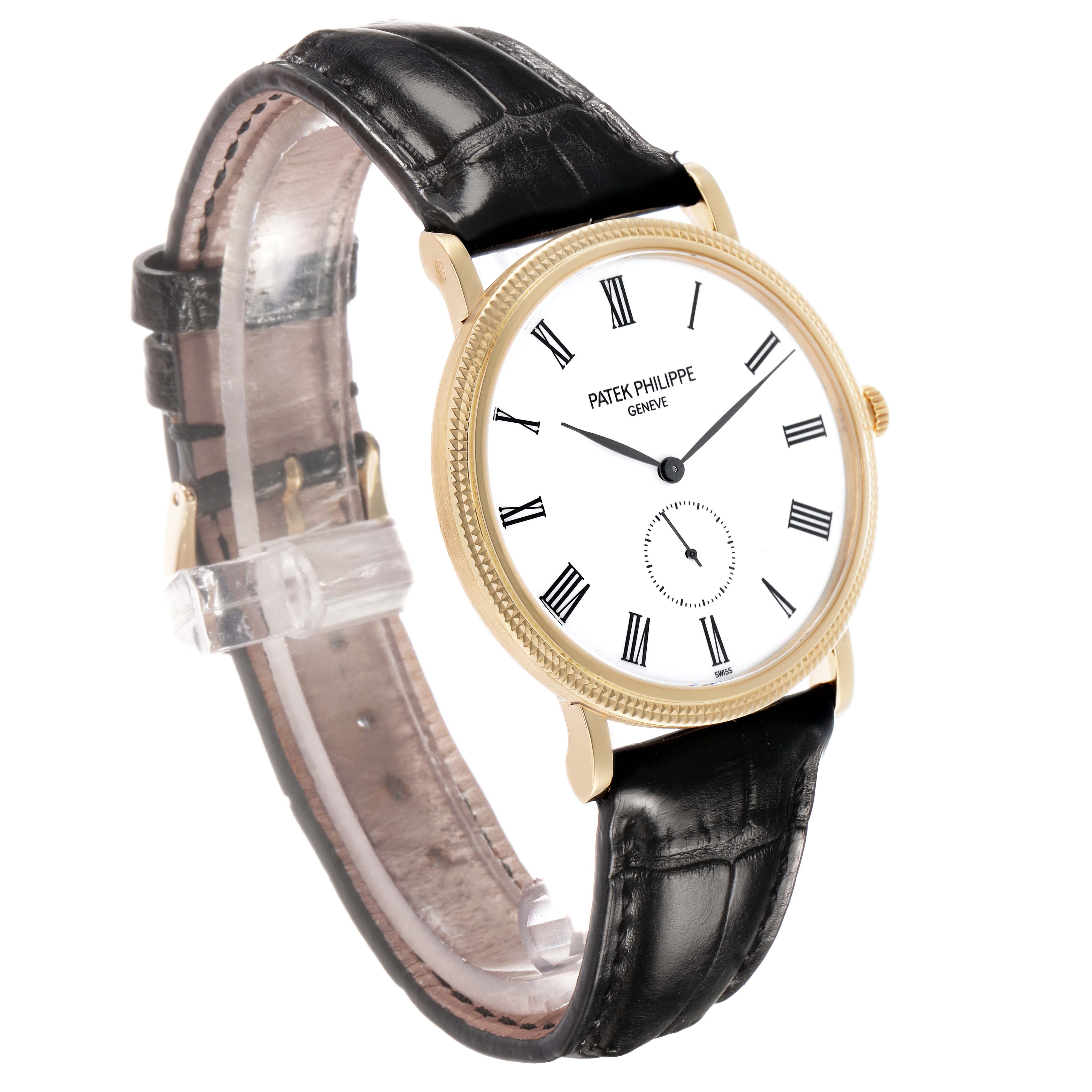 The Patek Philippe Calatrava 5119J Men's Yellow Gold White Dial watch is shown at a slight angle, highlighting the gold case, white dial with Roman numerals, and black leather strap.