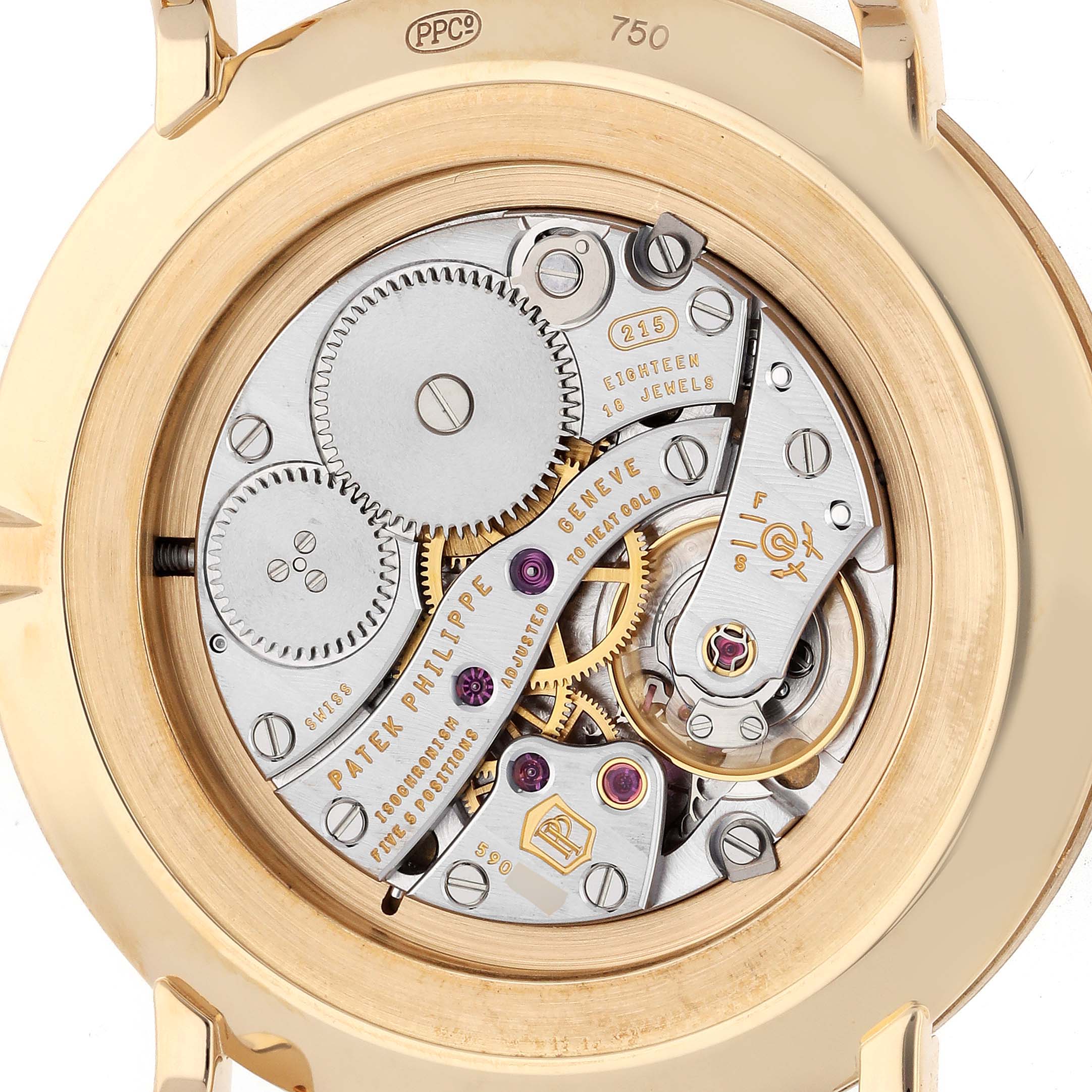 The image shows the case back of a Patek Philippe Calatrava 5119J Men's Yellow Gold White Dial watch, highlighting its intricate mechanical movement.