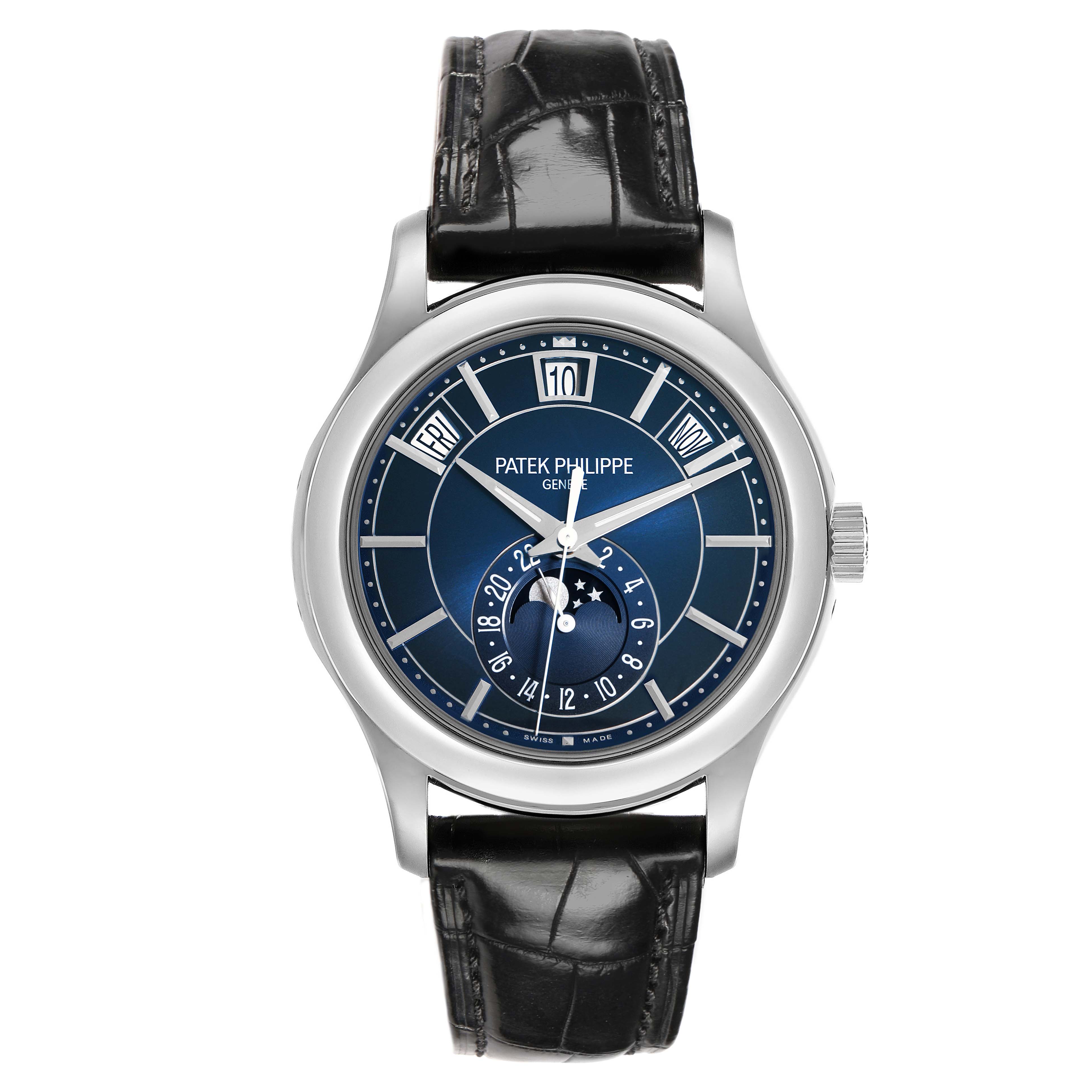 The Patek Philippe Complications 5205G-013 Men's White Gold Blue Dial watch is shown from the front, displaying the dial, hands, and date indicators with a black strap.