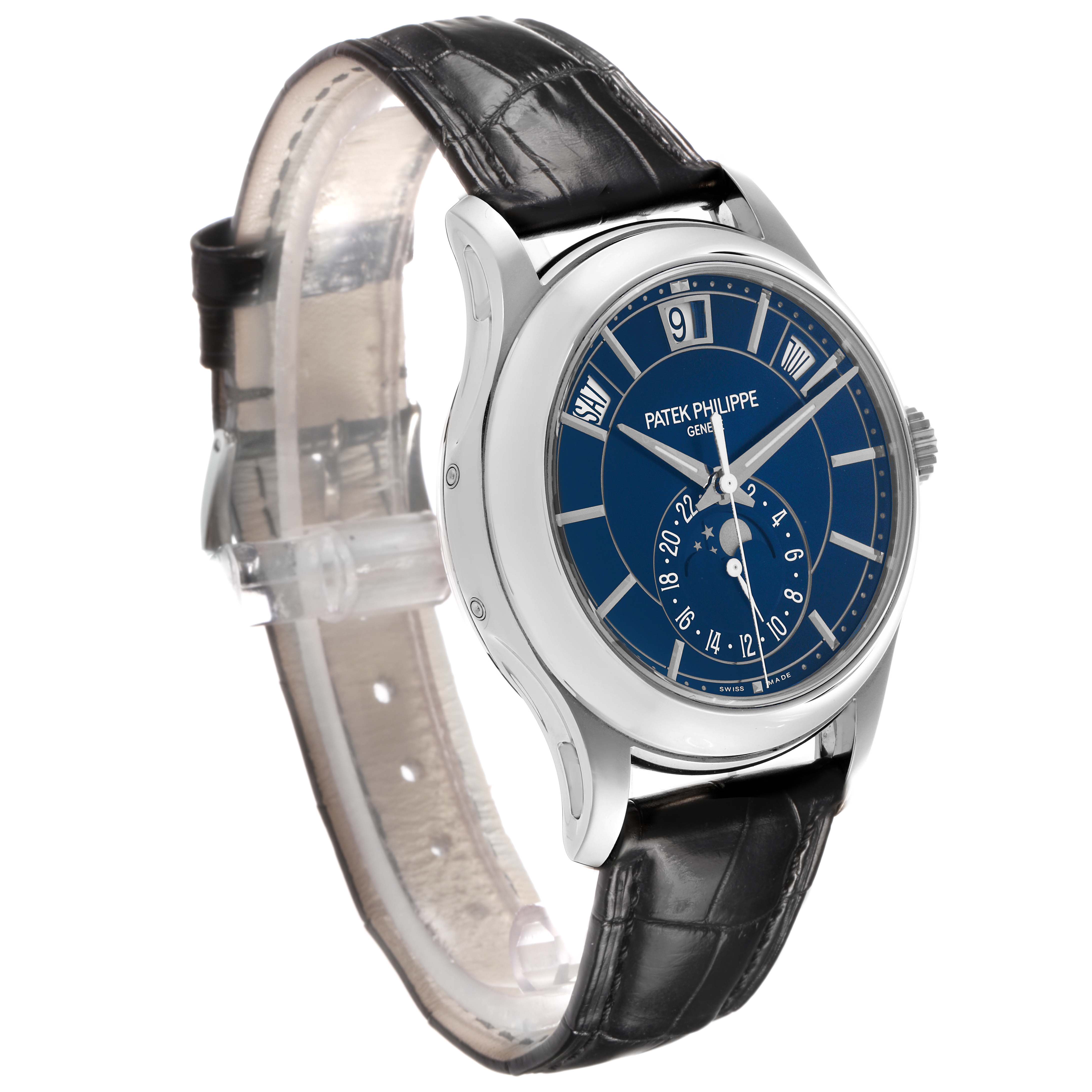 The Patek Philippe Complications 5205G-013 Men's White Gold Blue Dial watch is shown at a three-quarter angle, highlighting the blue dial and leather strap.