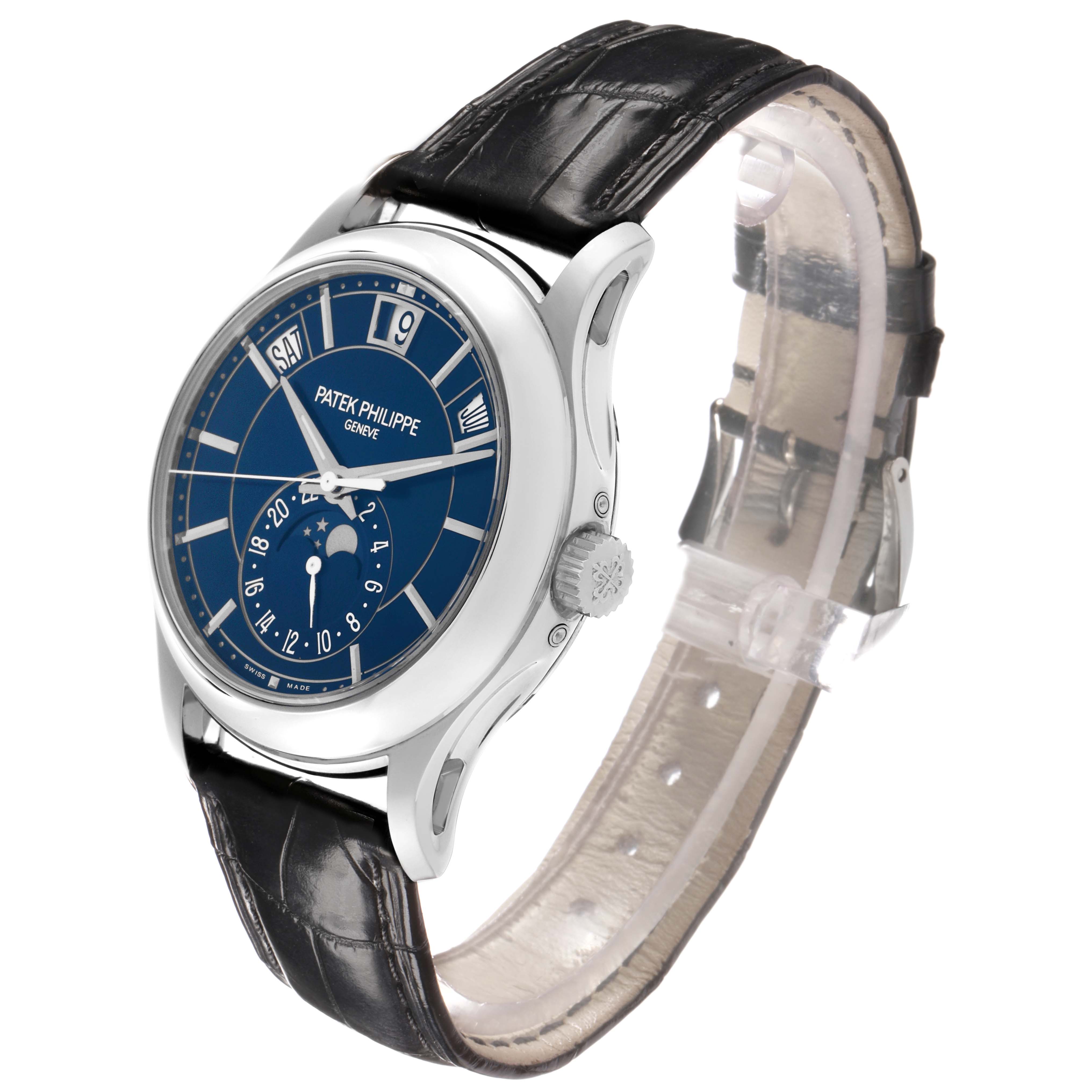 The Patek Philippe Complications 5205G-013 Men's White Gold Blue Dial watch is shown at a three-quarter angle, displaying the dial, case, crown, and strap.
